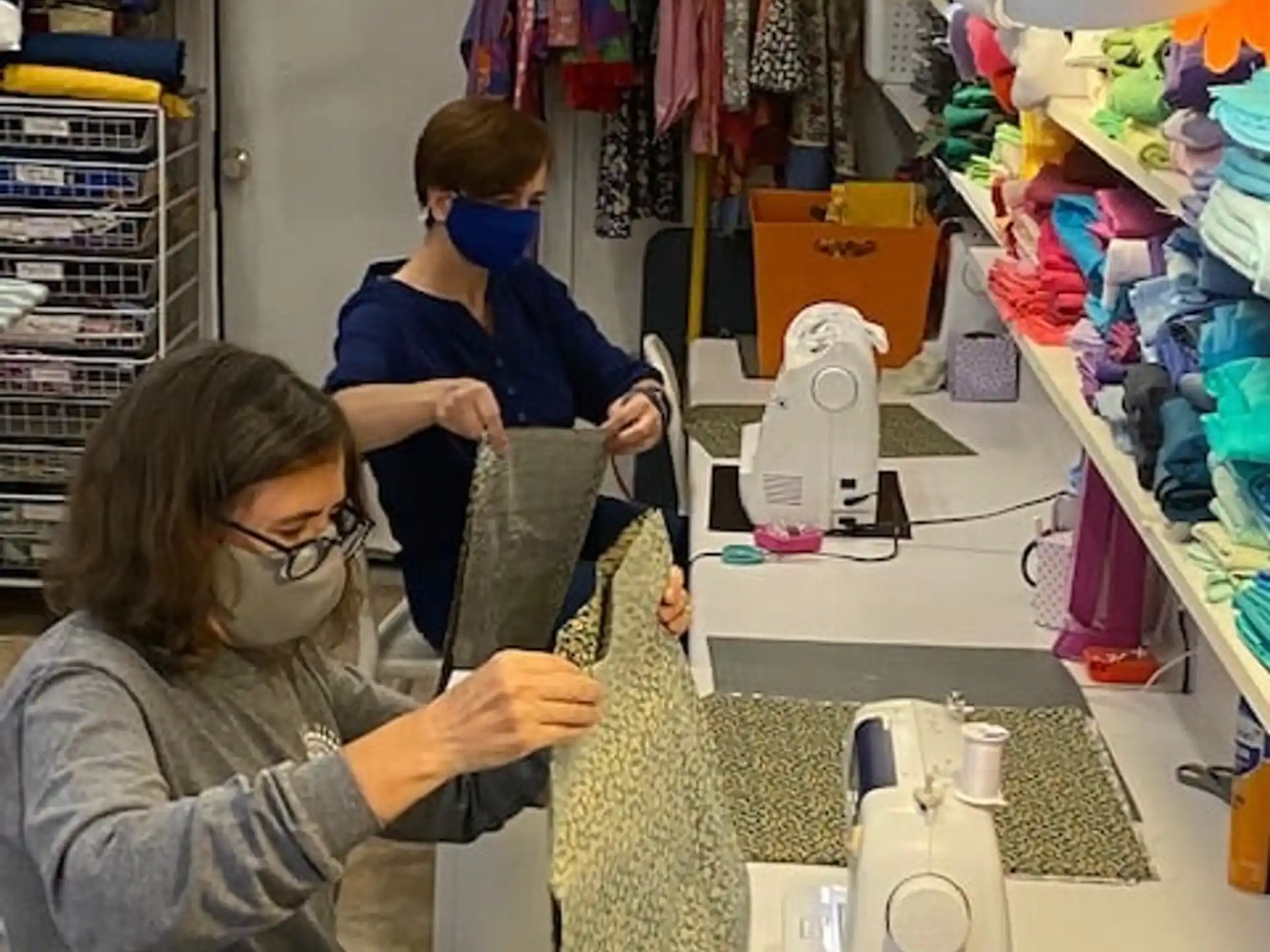 a person working on a sewing machine