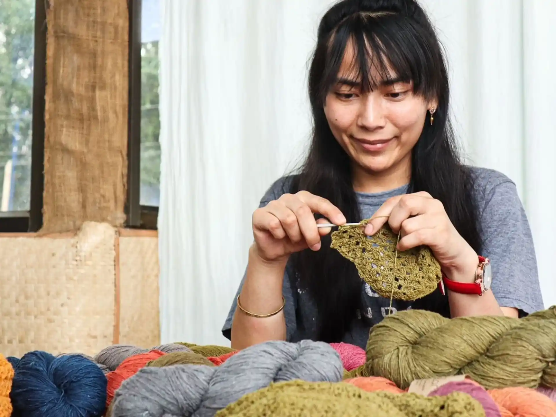 a woman holding a snake