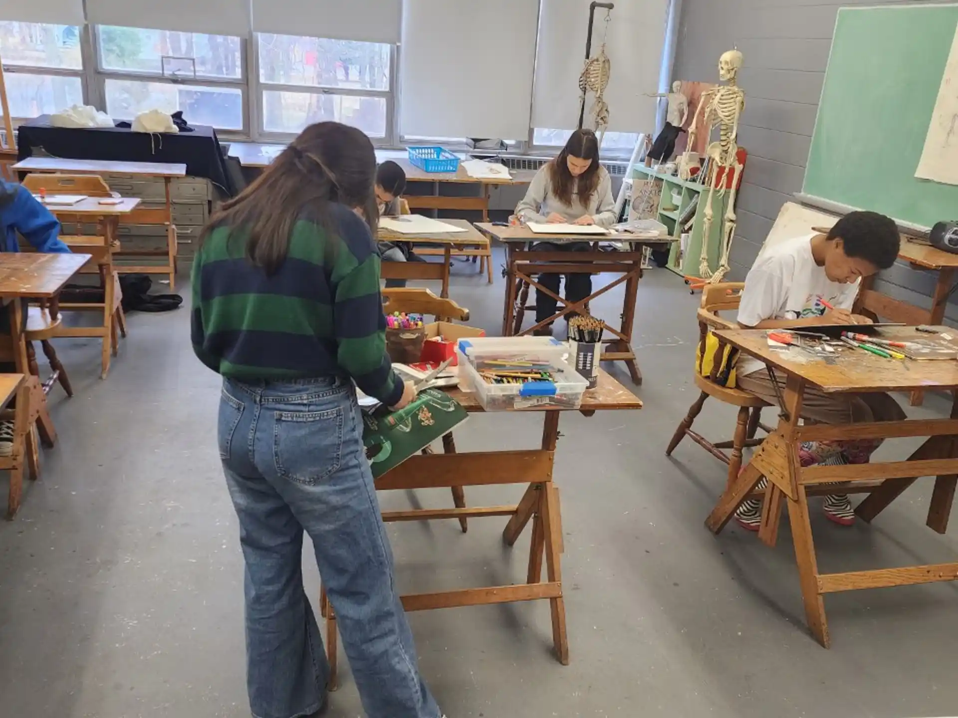 a person standing in a classroom