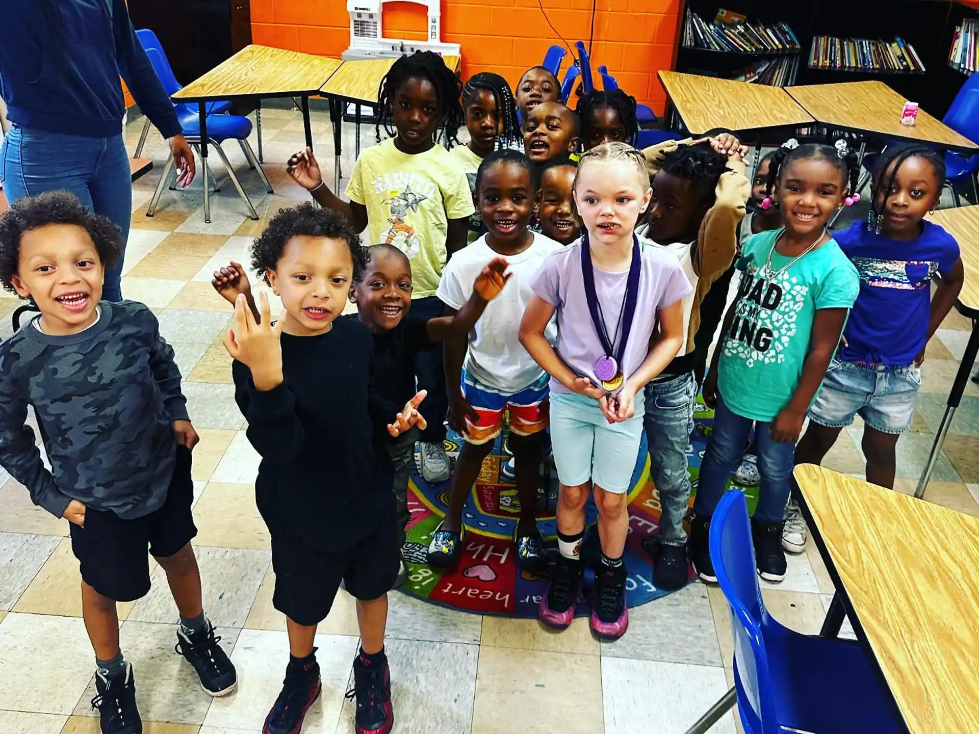 a group of children posing for a photo