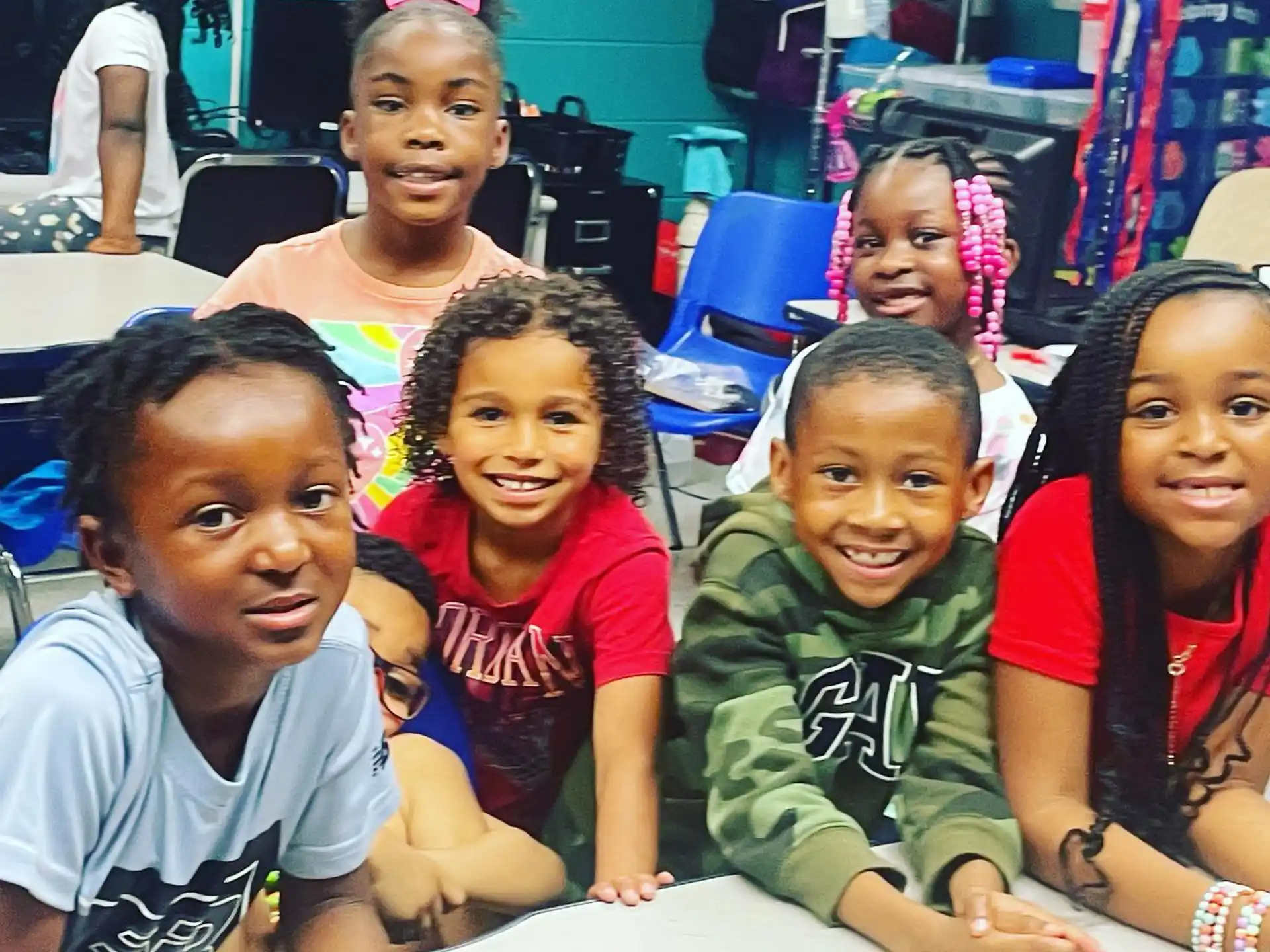 a group of children sitting together