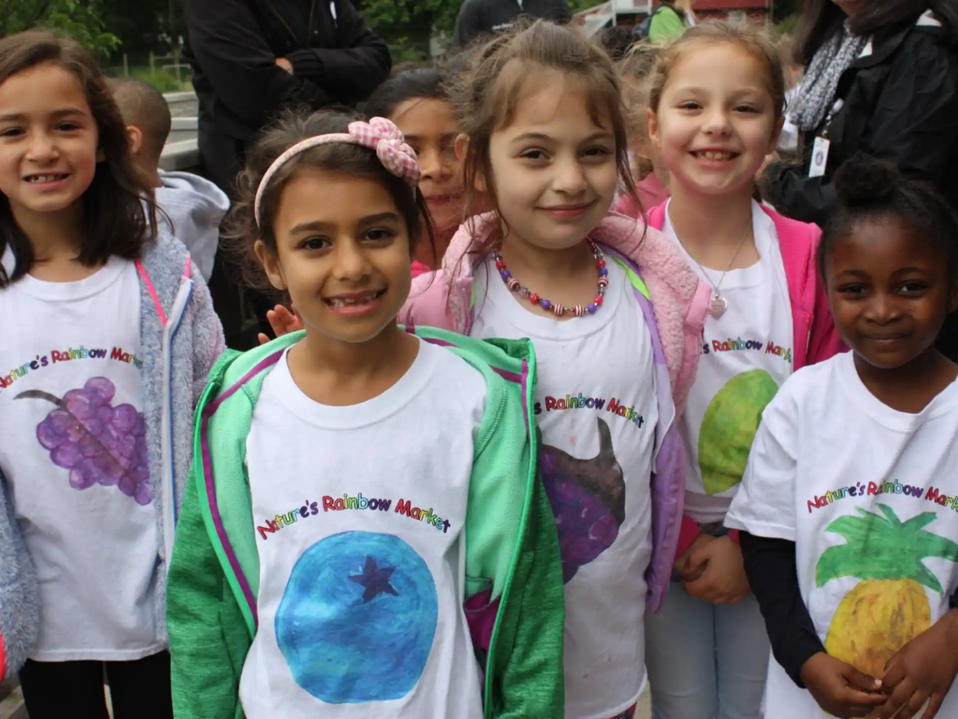 a group of girls posing for a photo