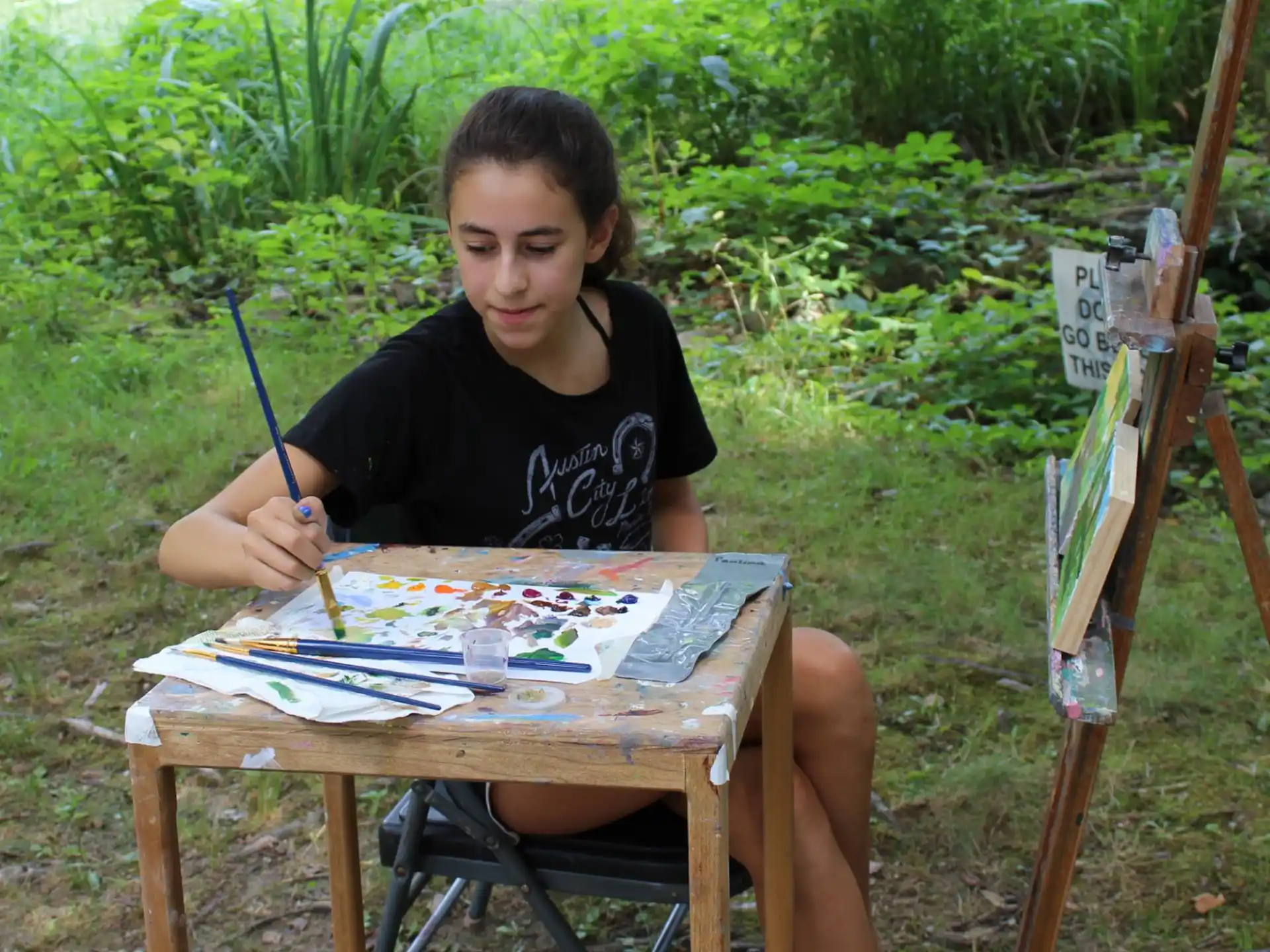 a person painting outside