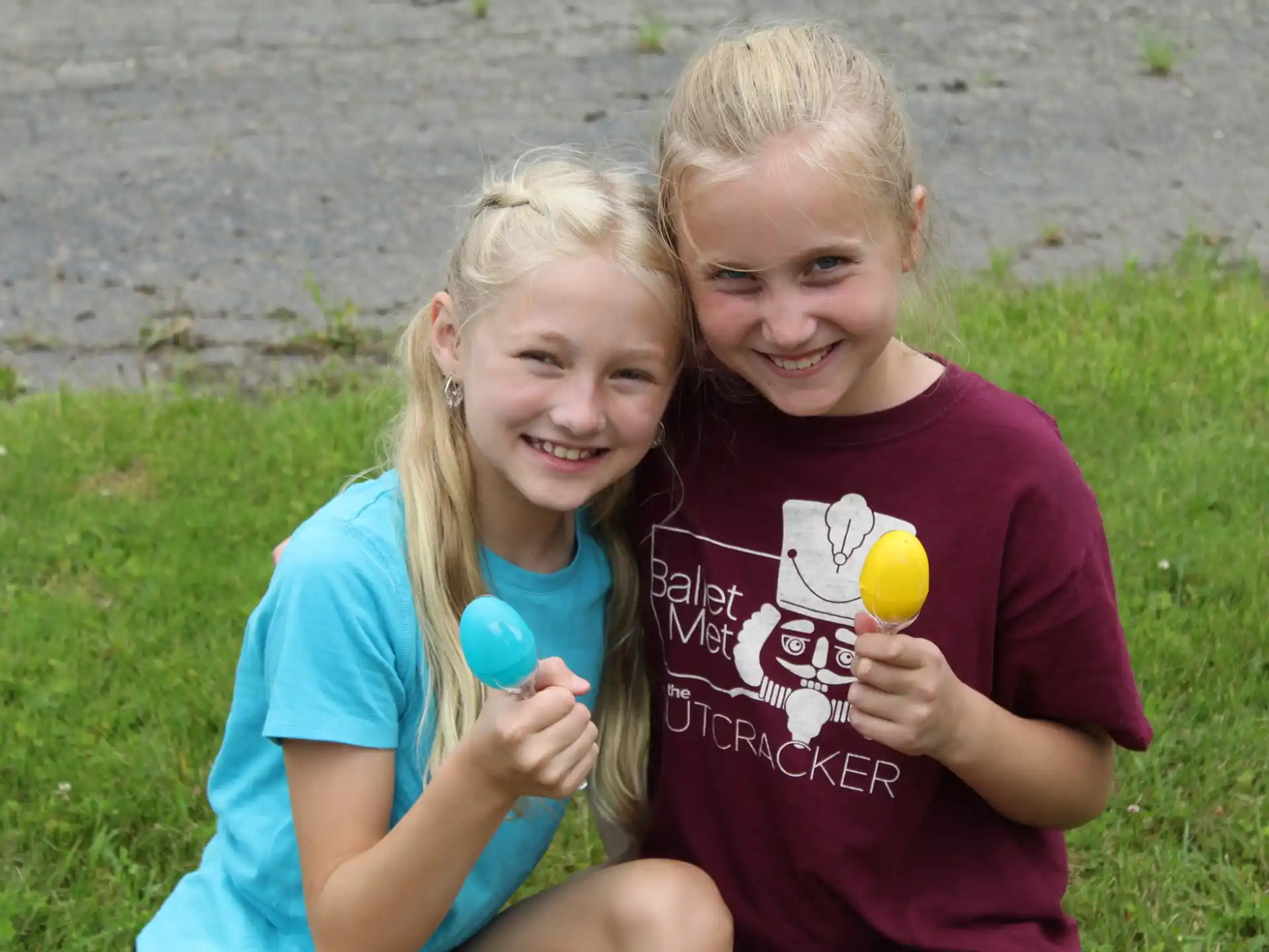 a couple of girls posing for the camera