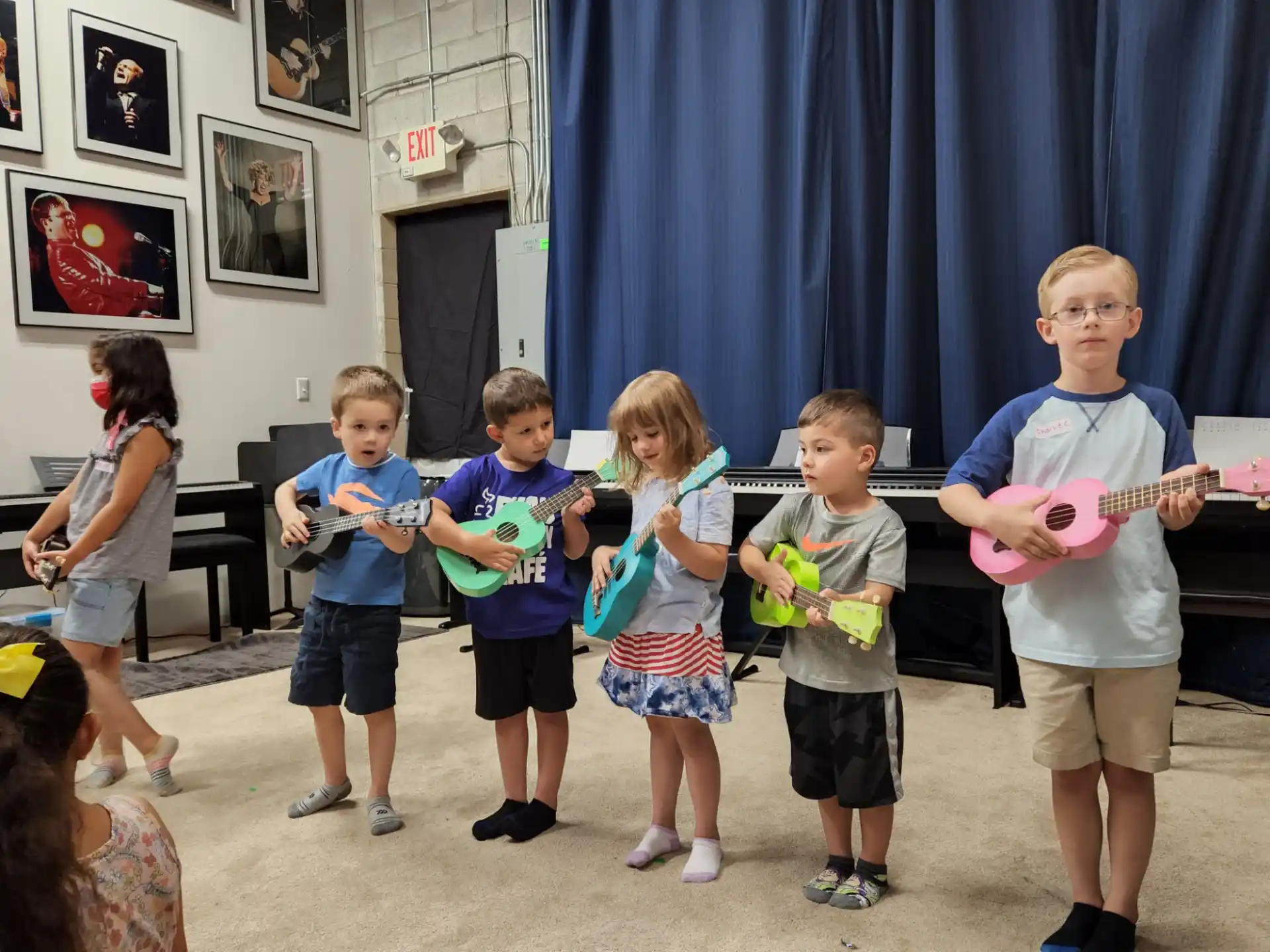 a group of children holding toys