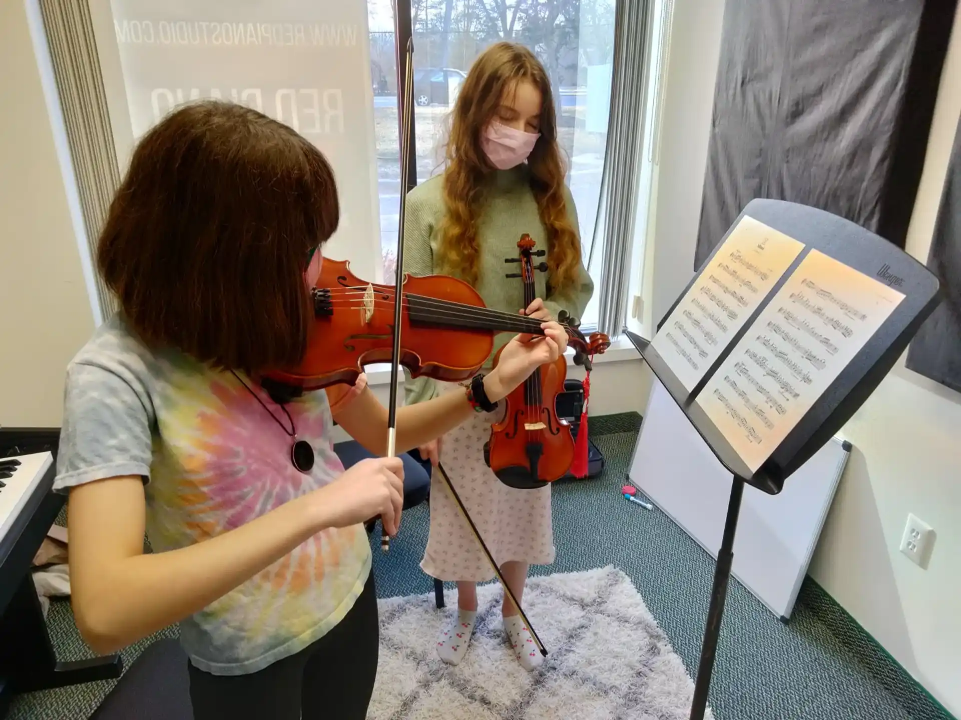 a person playing a violin