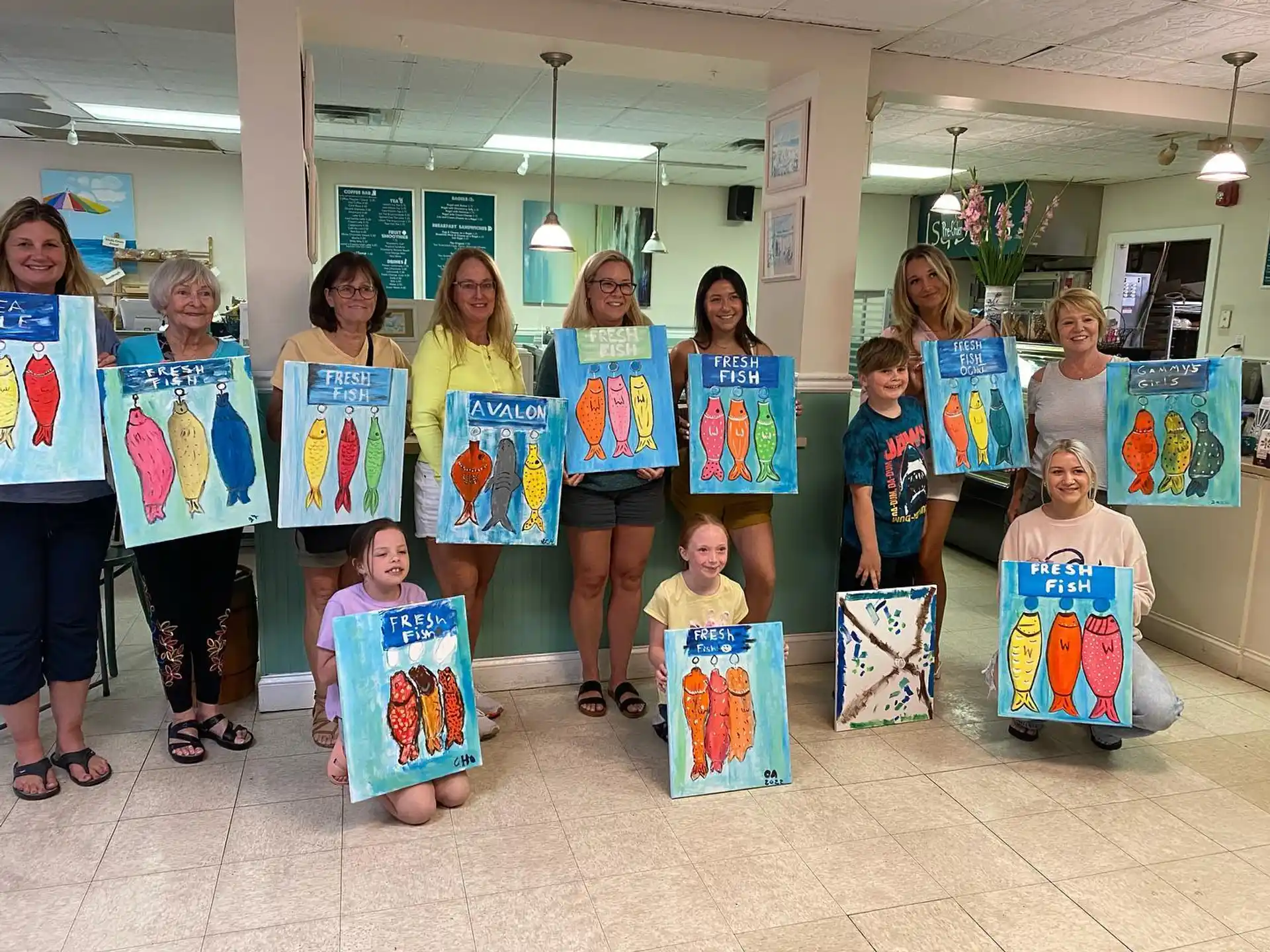 a group of children holding up posters