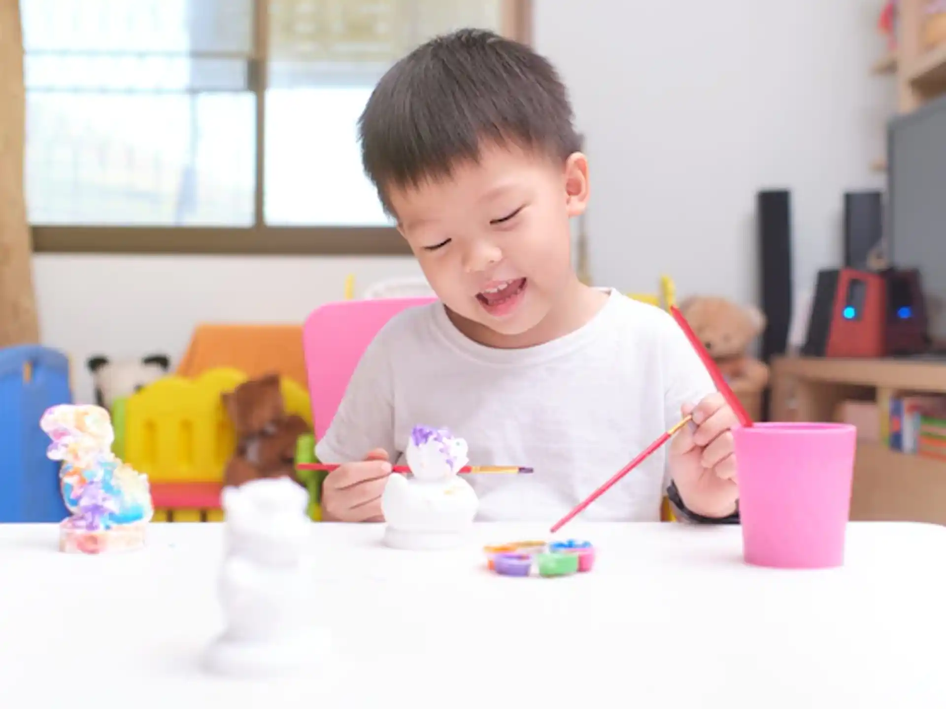 a child eating a cupcake