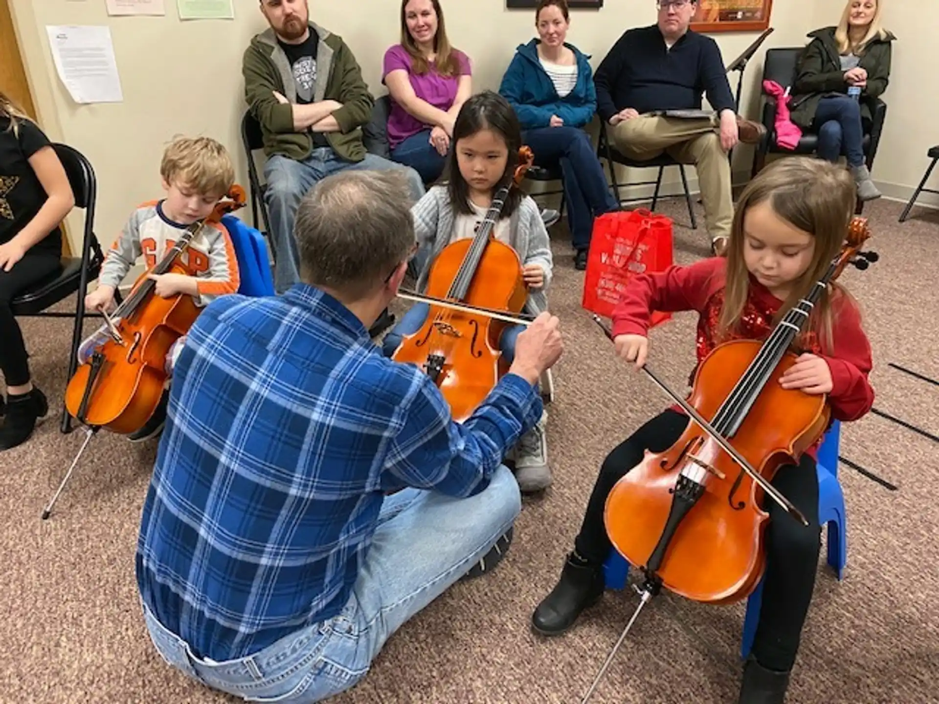 a group of people playing instruments