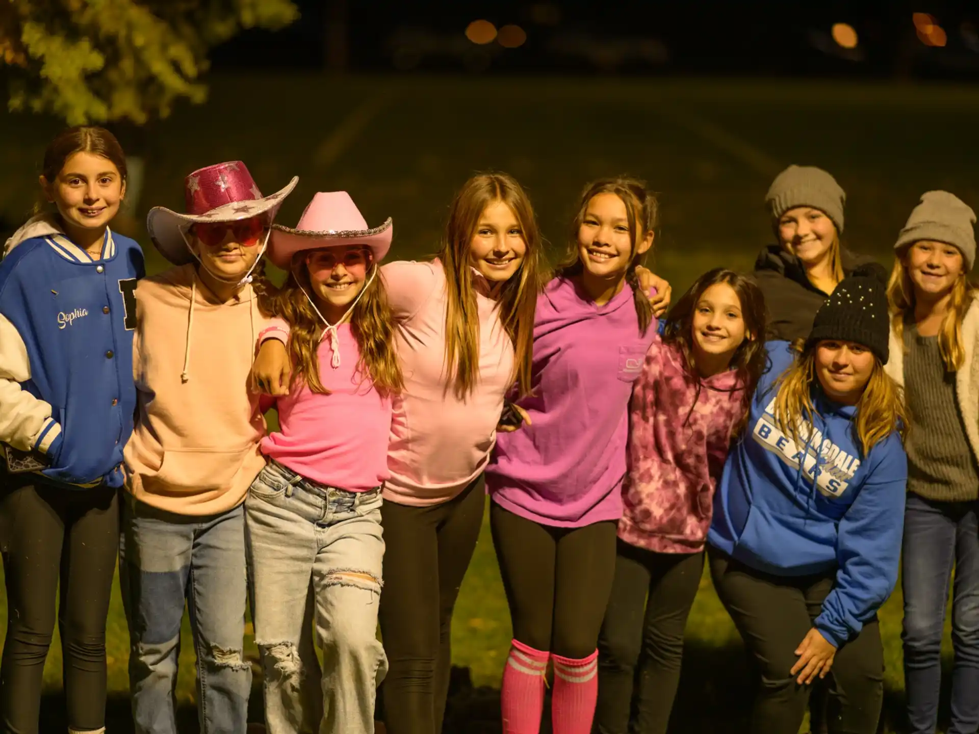 a group of people posing for a photo