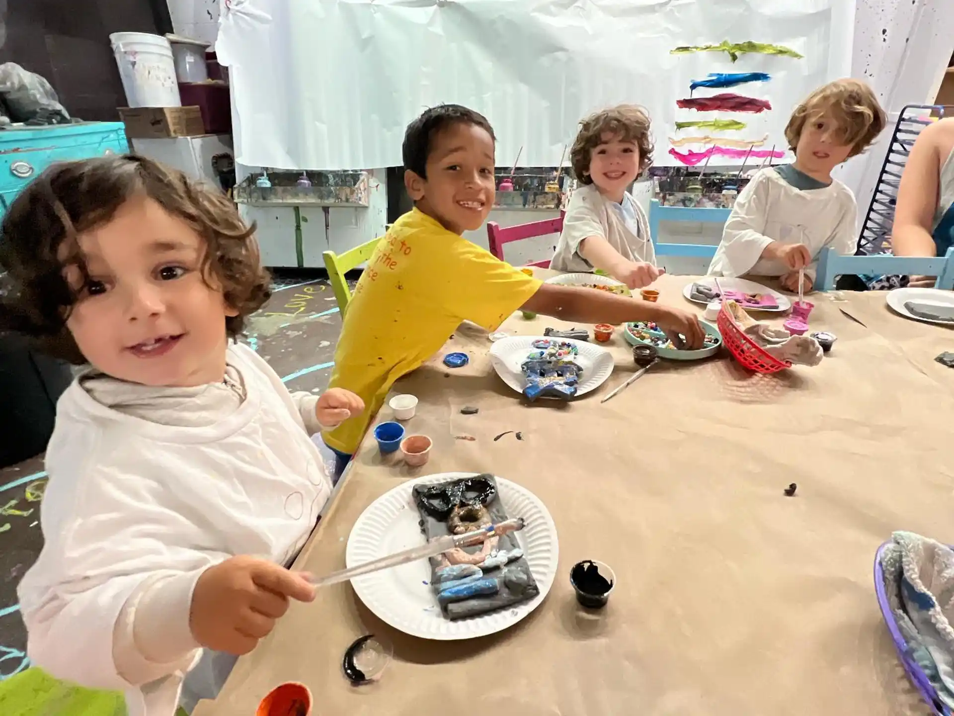a group of children playing with toys