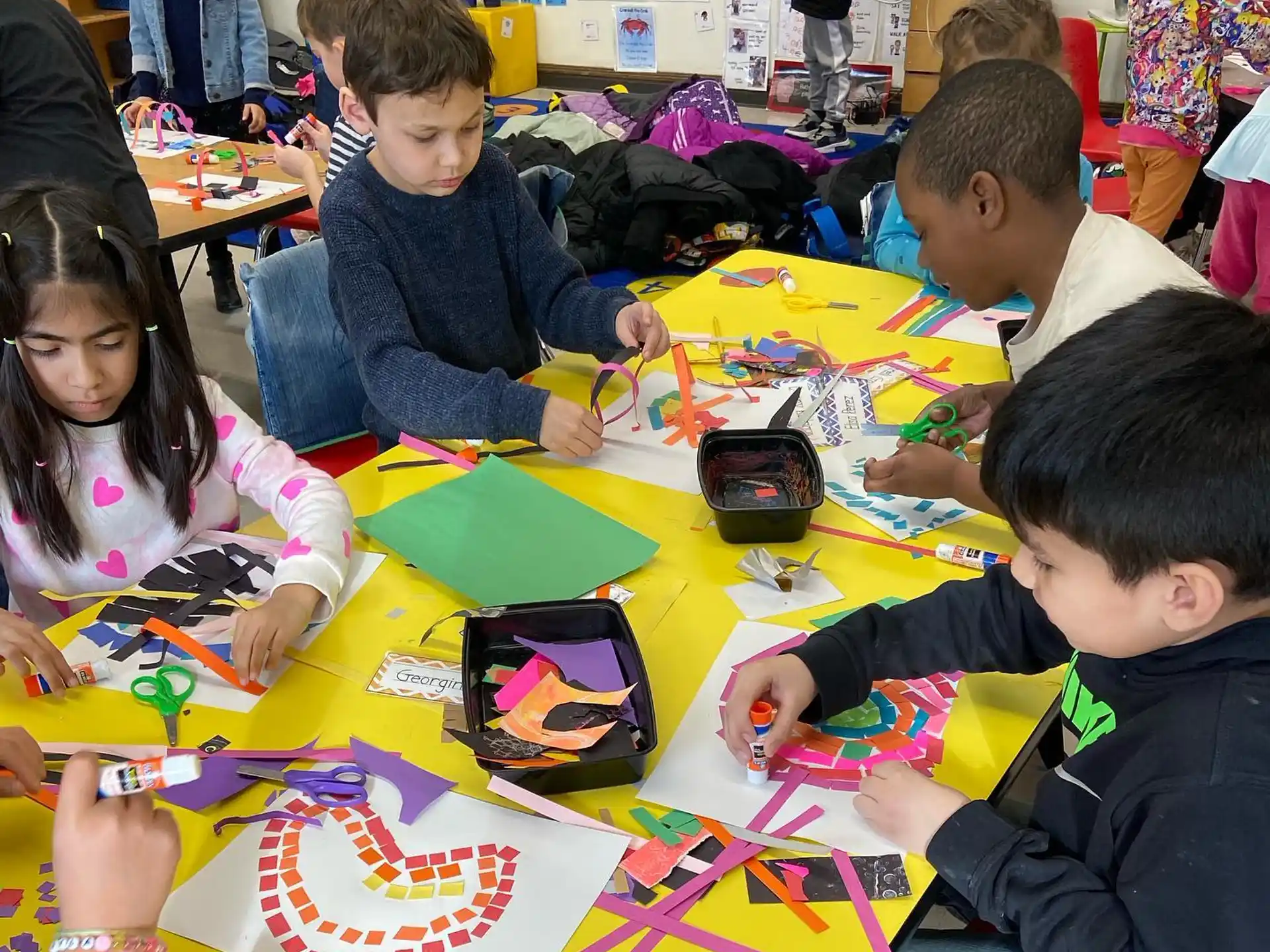 a group of children playing a board game