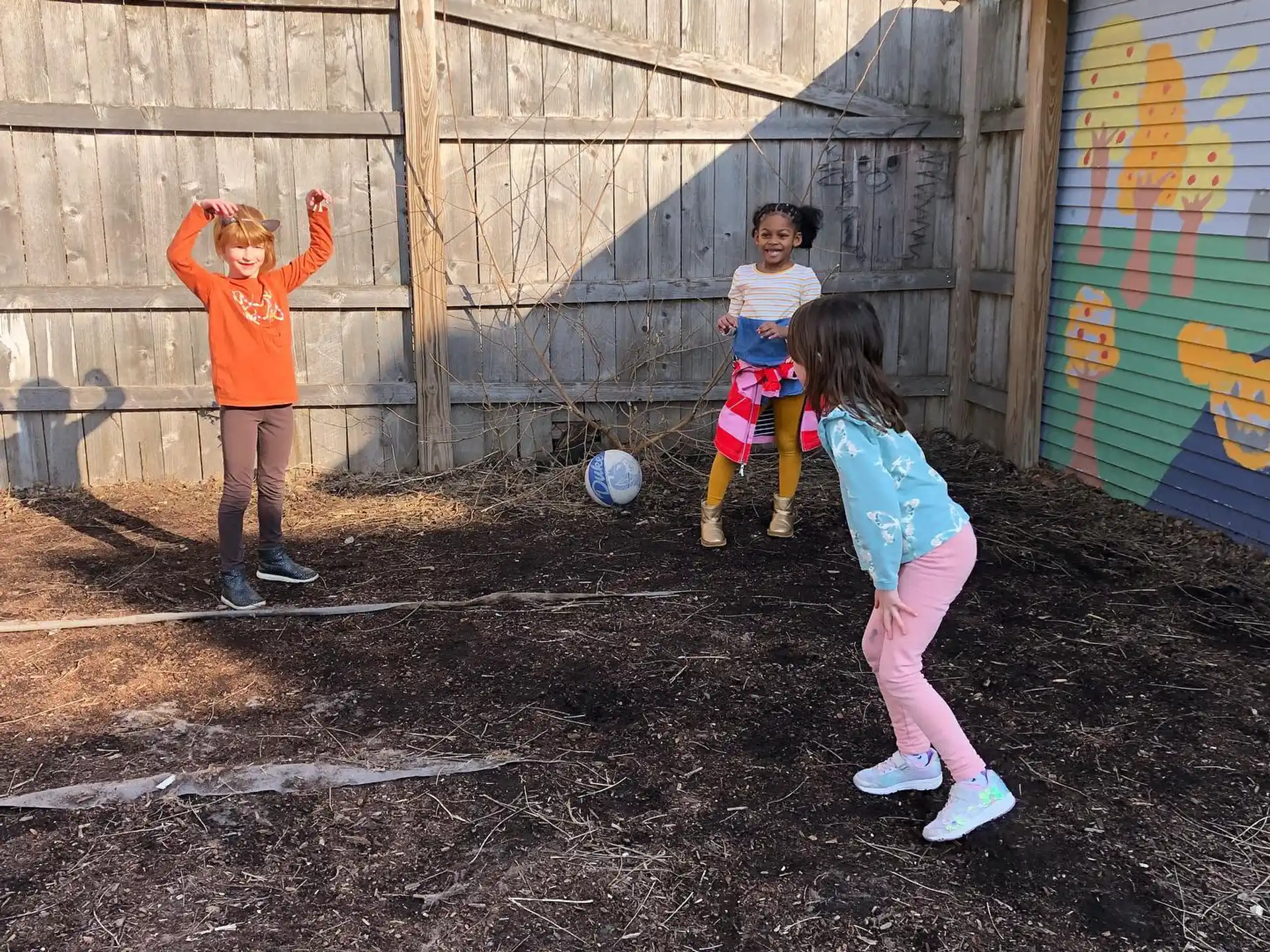 a group of kids play football