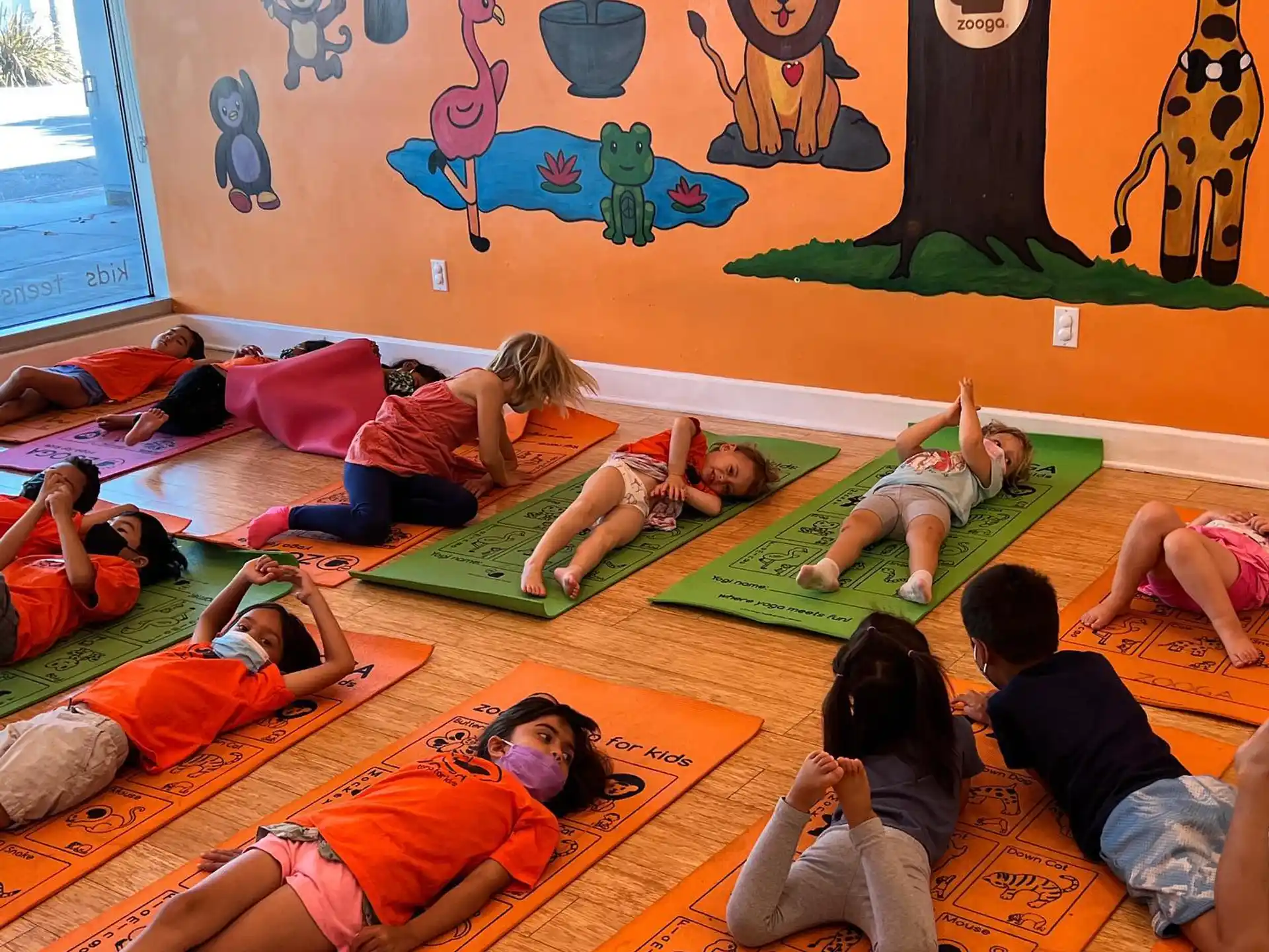 a group of people sitting on the floor