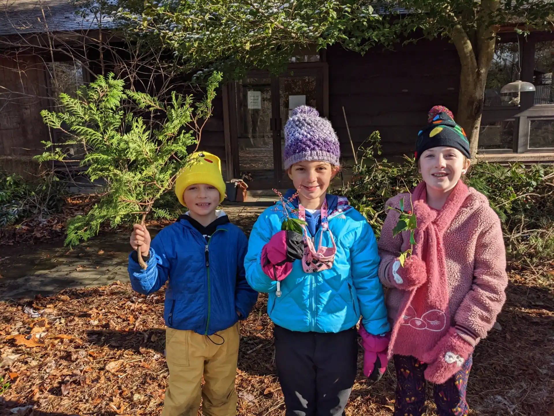 a group of children wearing hats