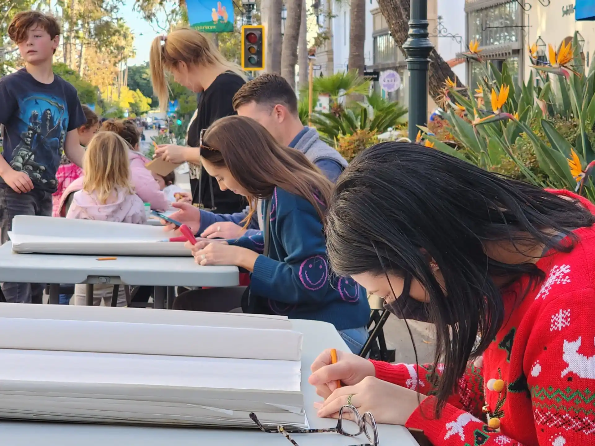 a group of people sitting at tables