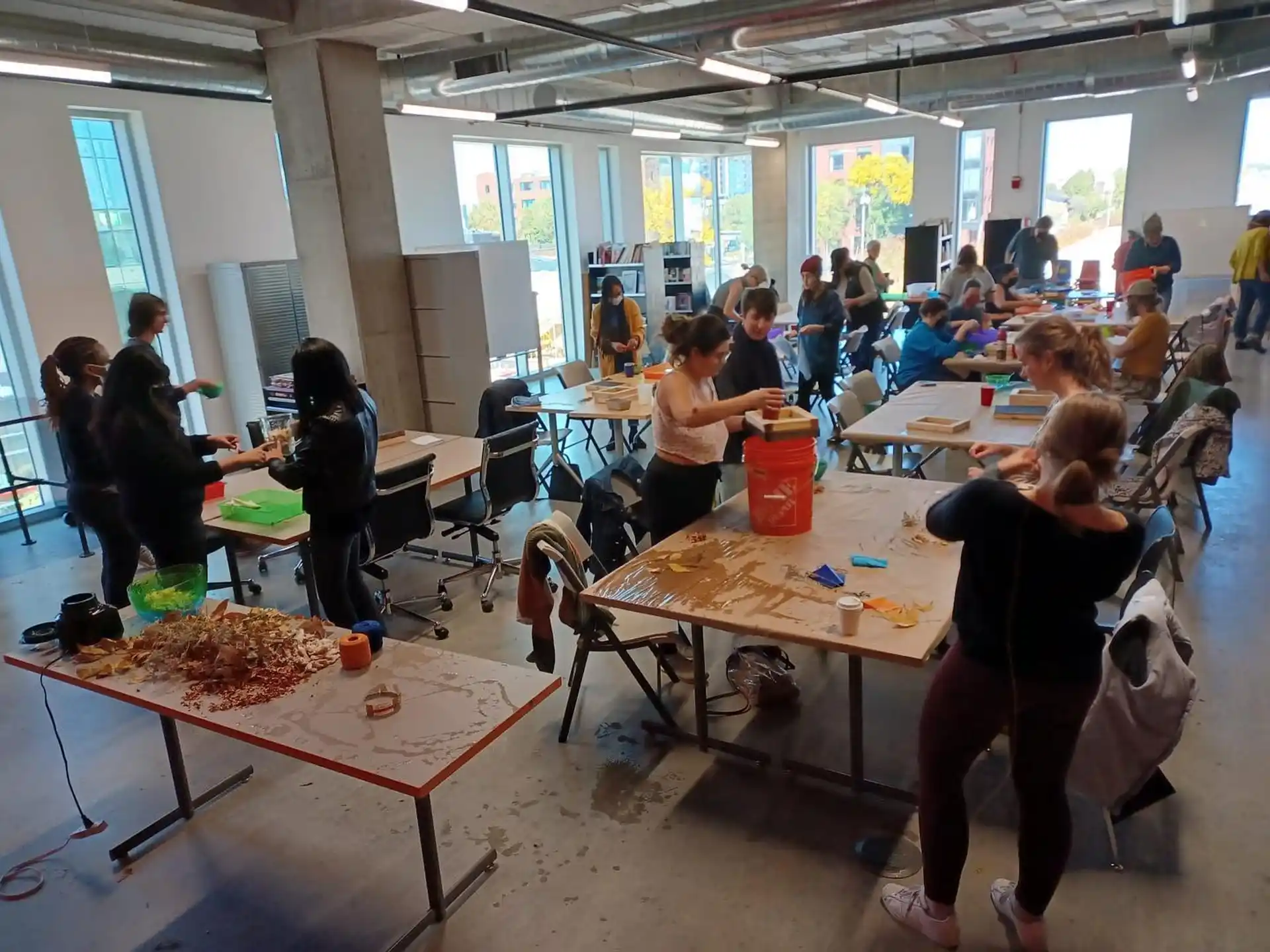 a group of people sitting at tables