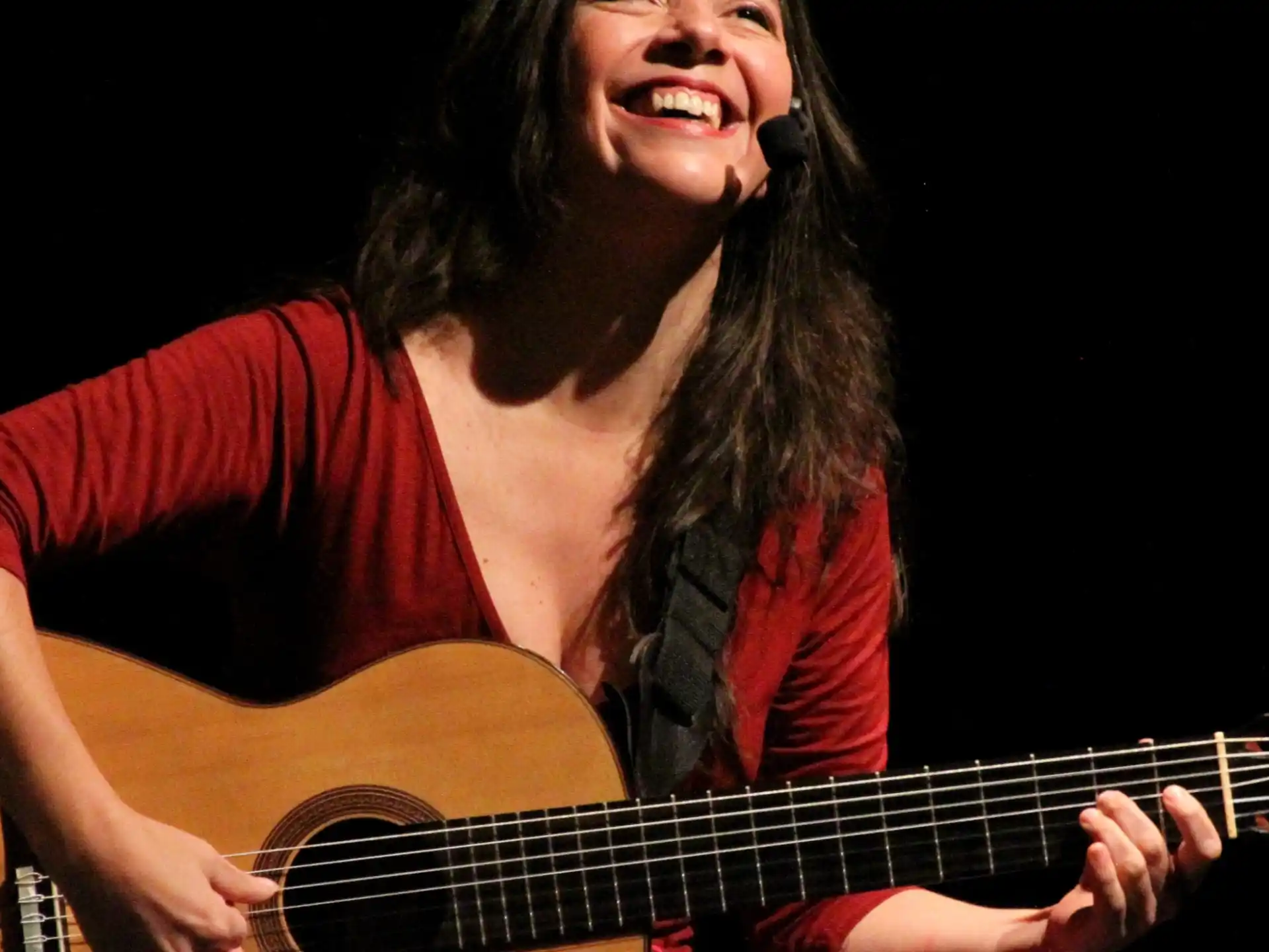 a person playing a guitar