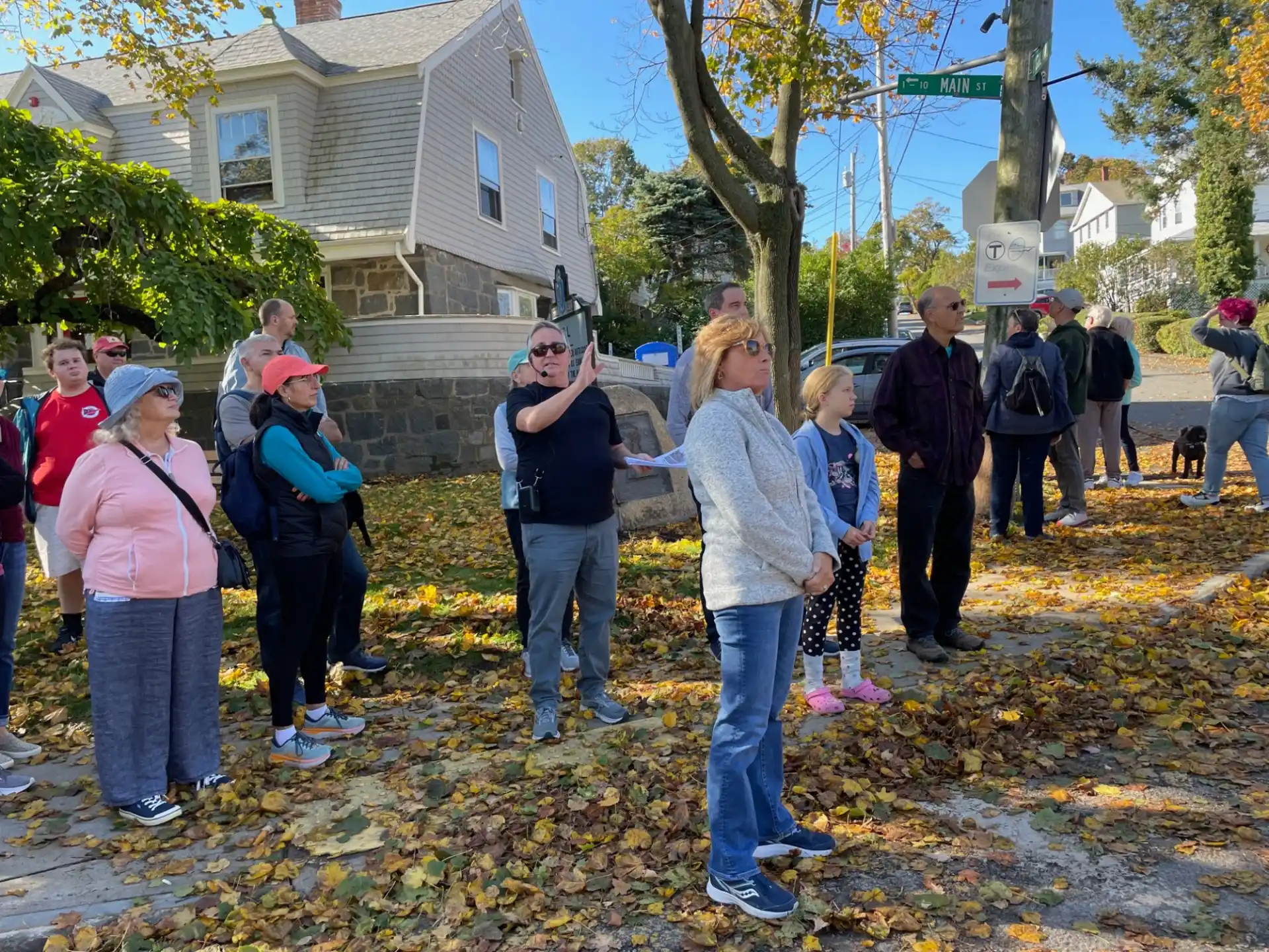 a group of people gathered around a garden