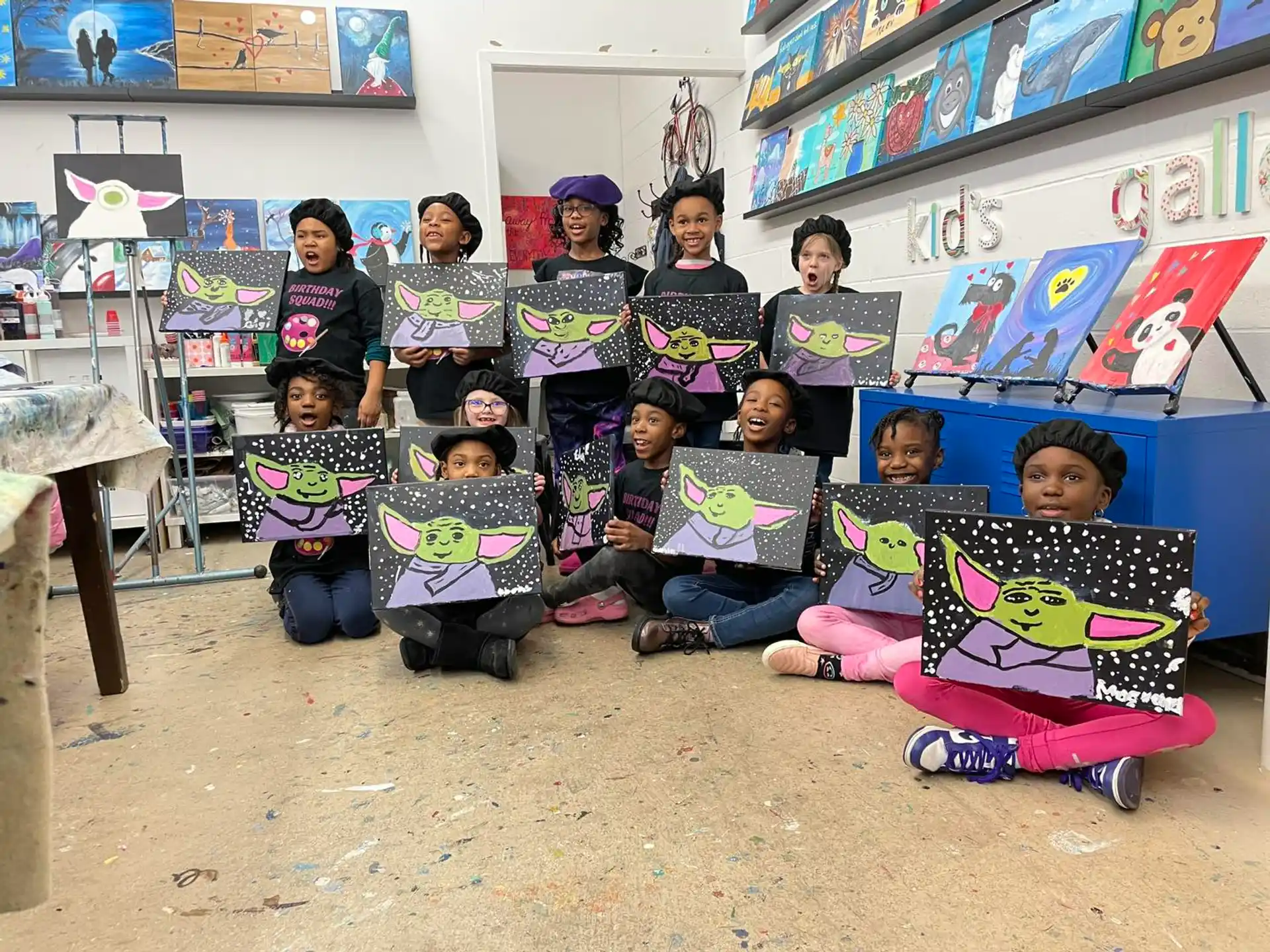 a group of children holding posters