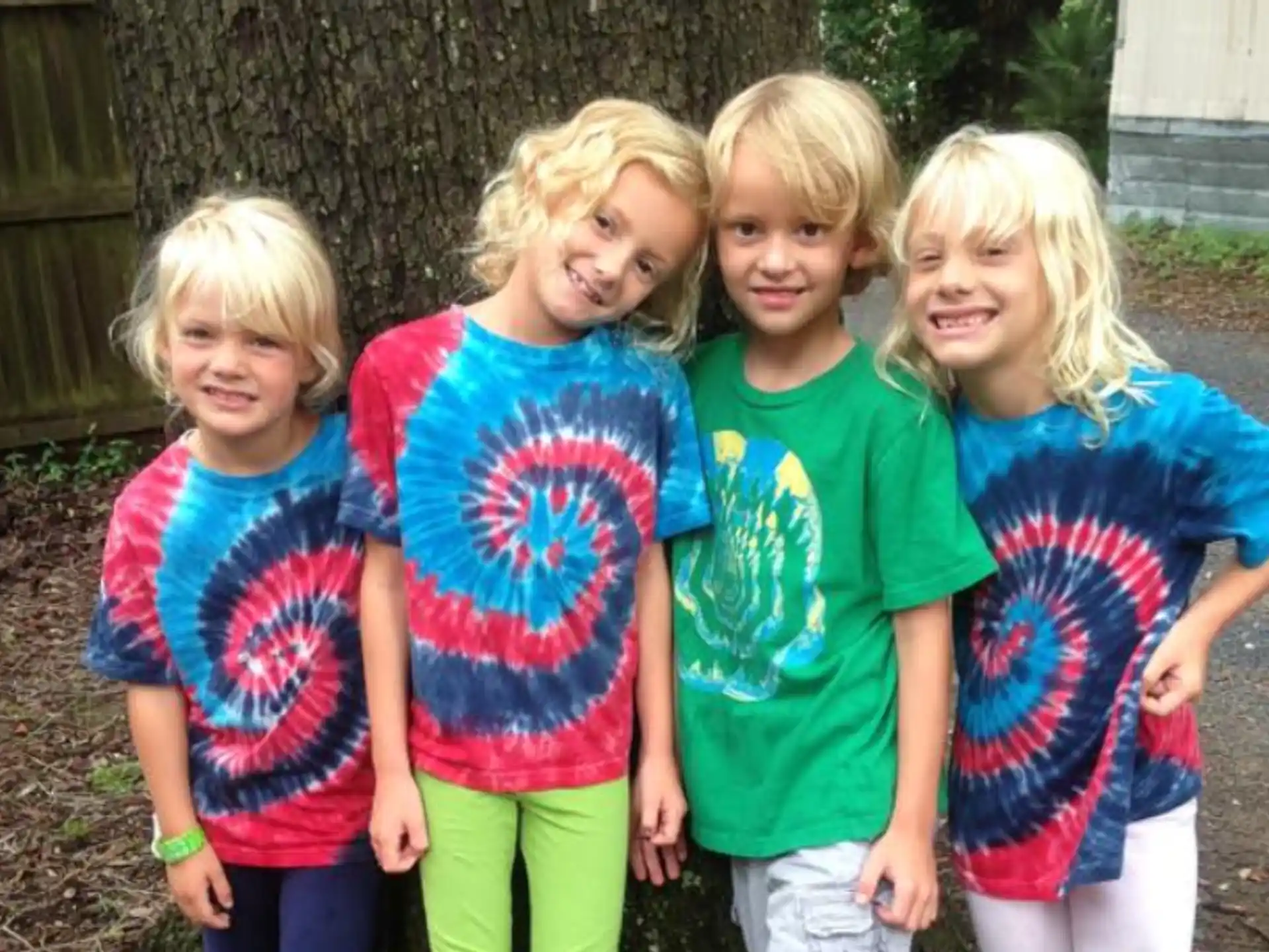 a group of children posing for a photo
