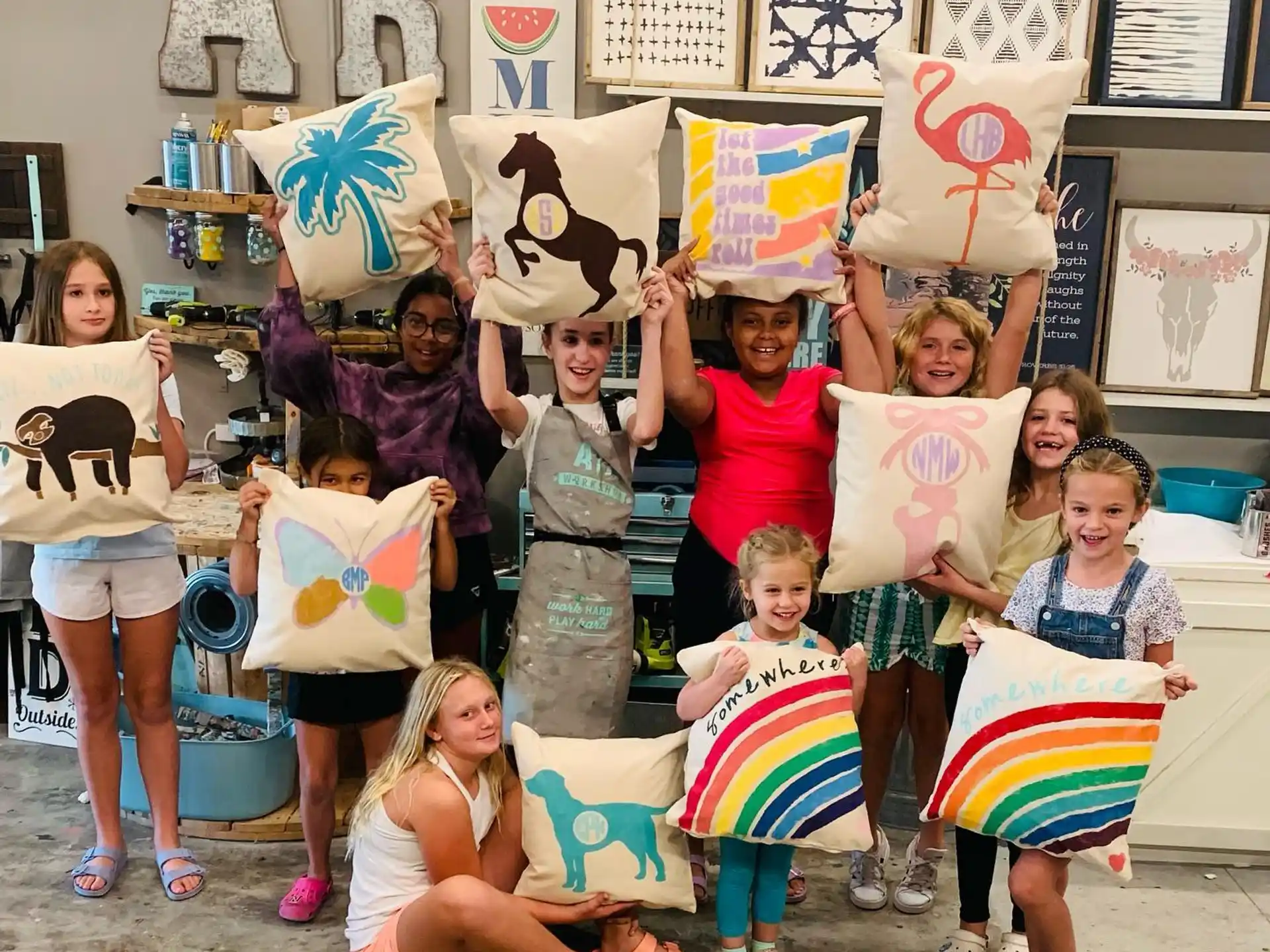 a group of children holding up signs