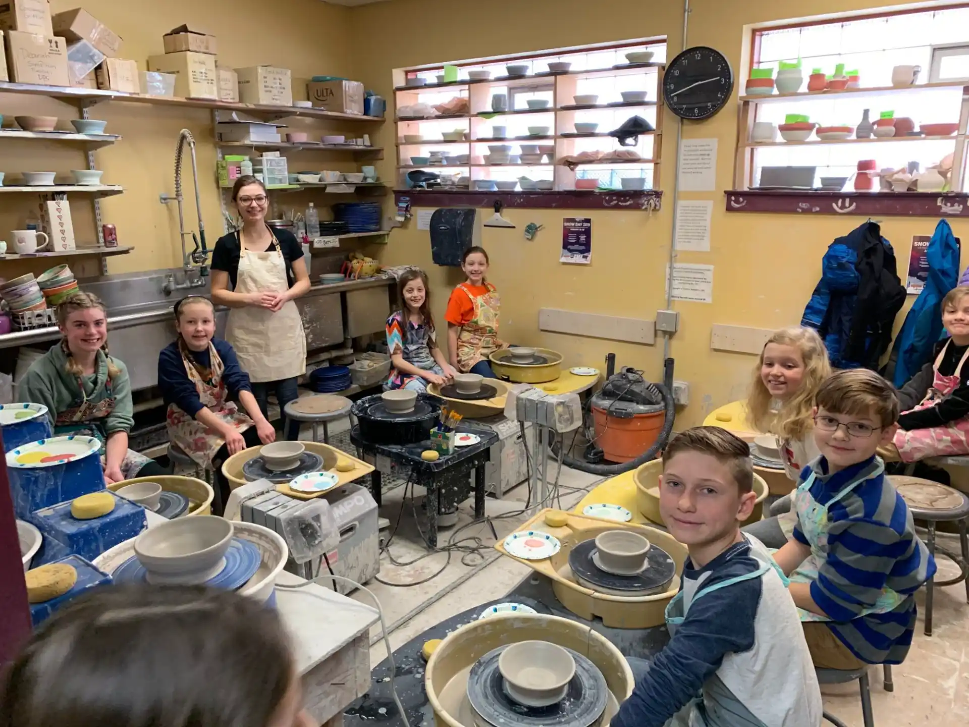 a group of people in a kitchen