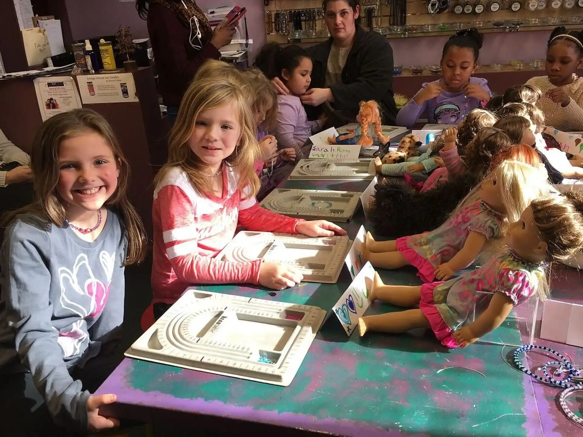 a group of children sitting at a table