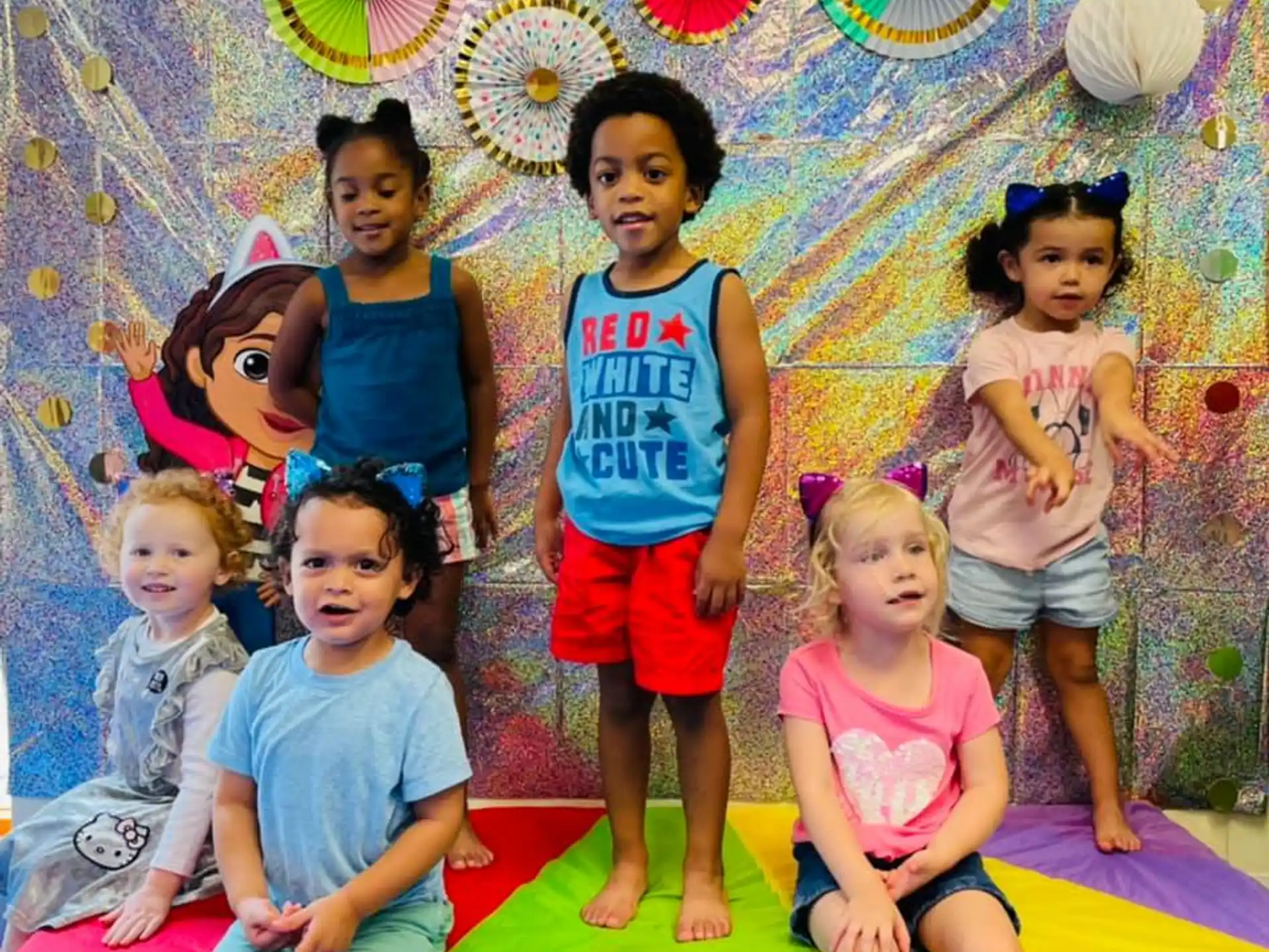 a group of children posing for a photo