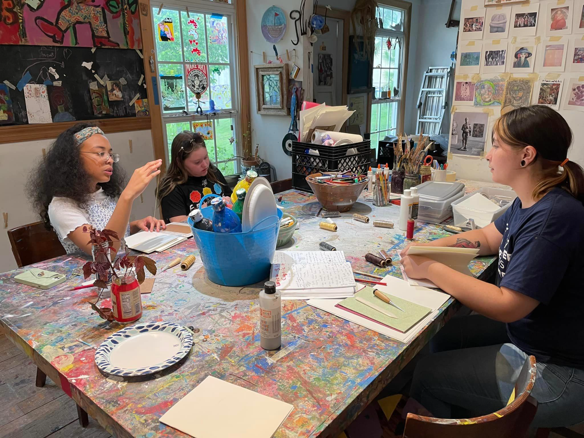 a group of people sitting around a table