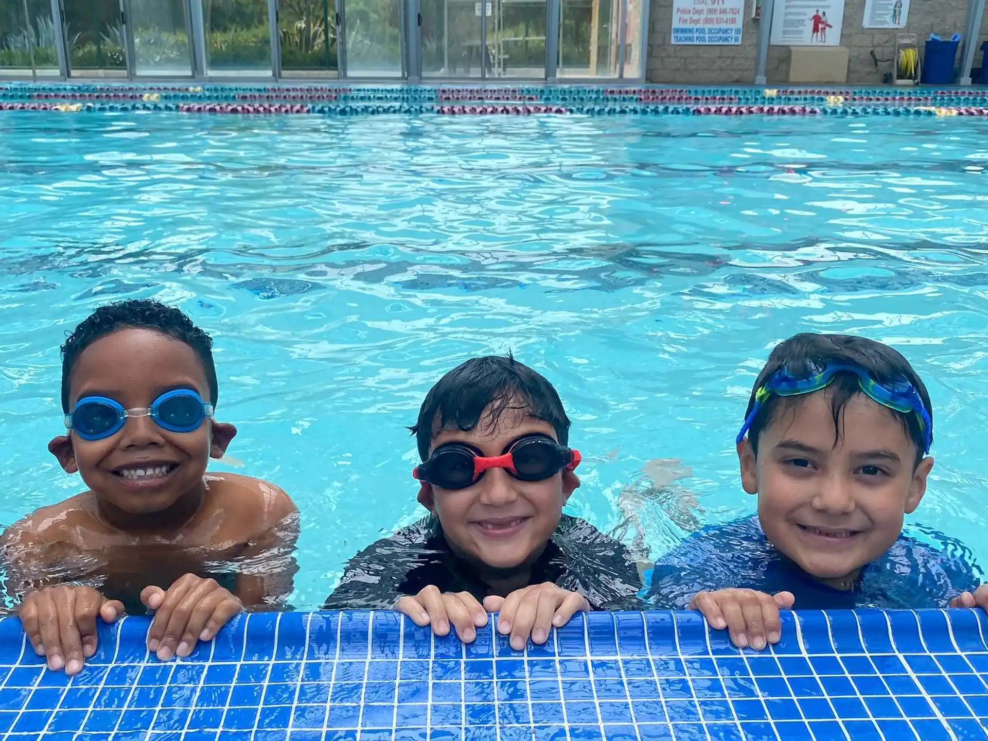 a group of boys in a pool