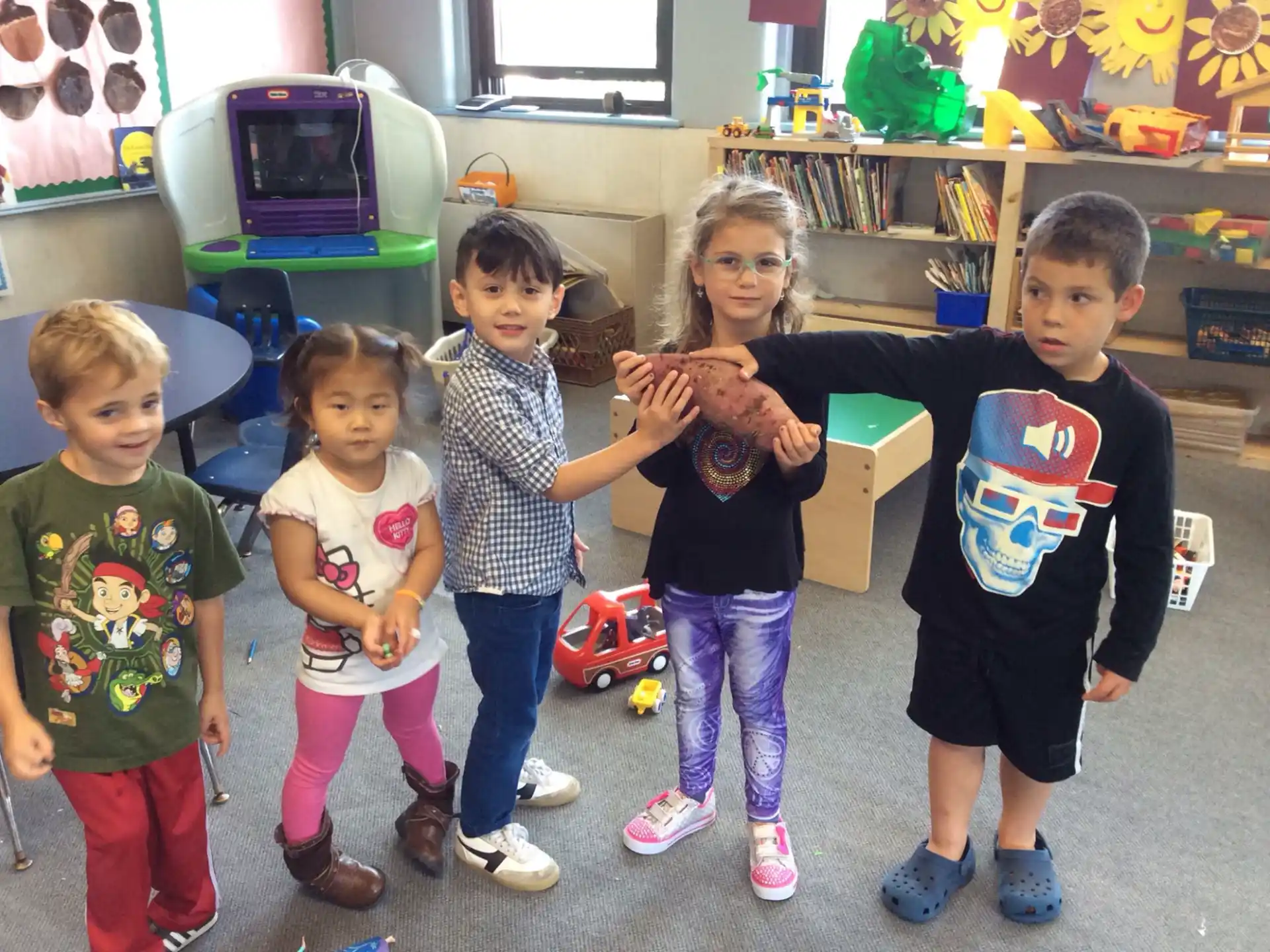a group of children posing for a photo