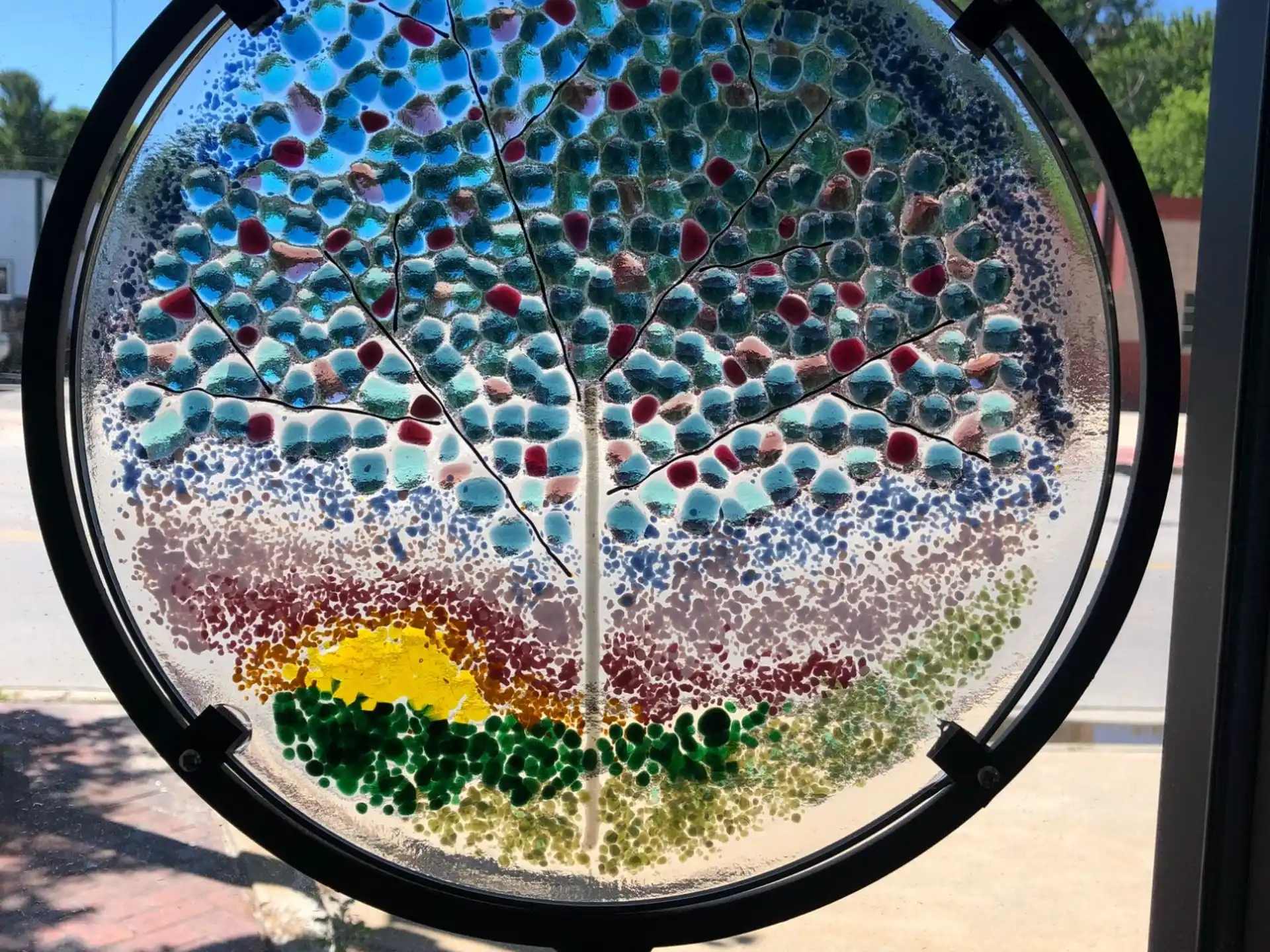 a large metal ball with flowers
