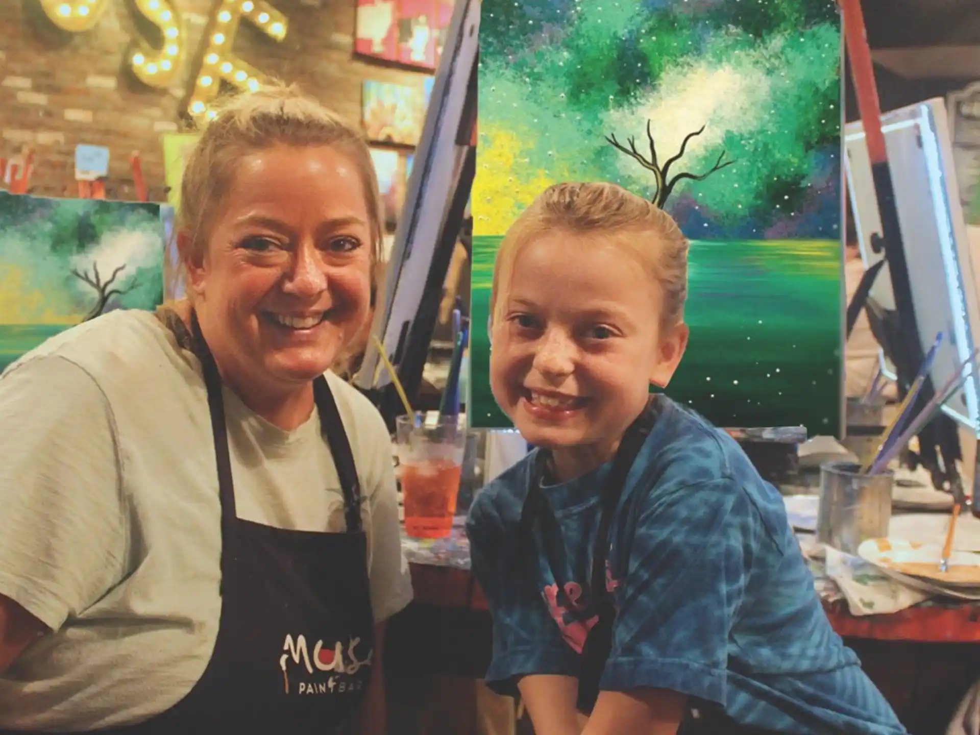a person and a boy posing for a picture