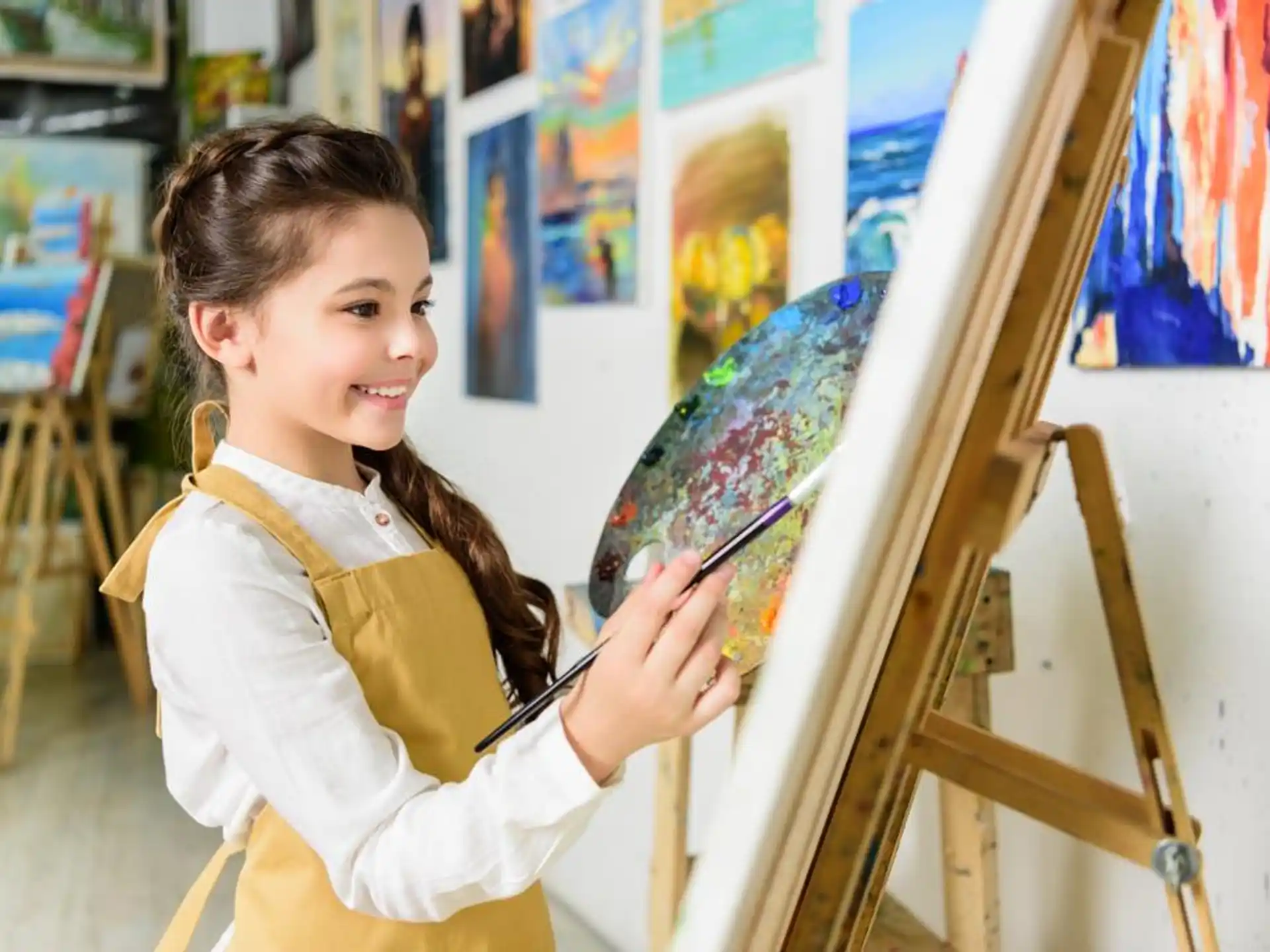 a young girl painting