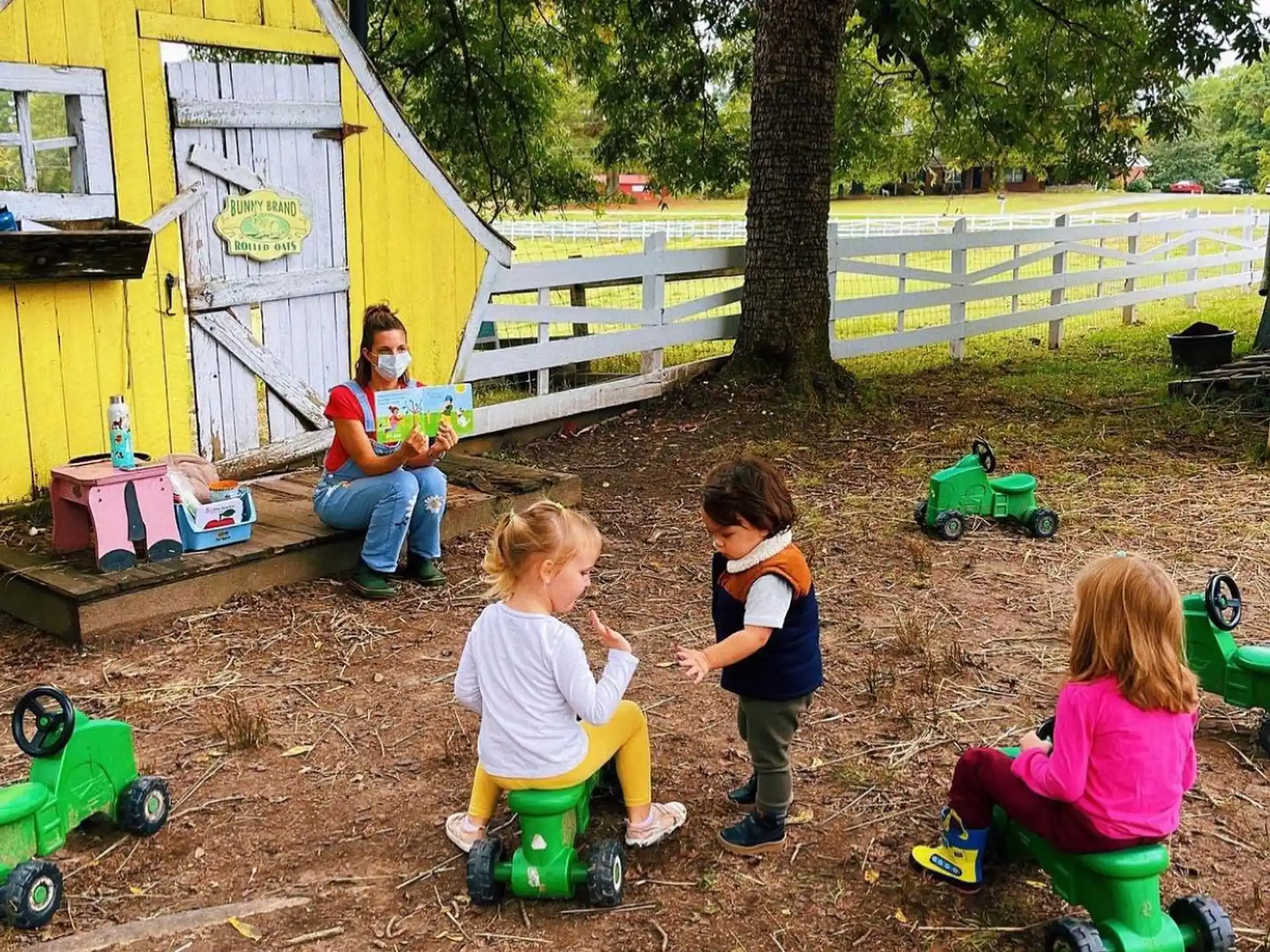 a group of children playing in the dirt