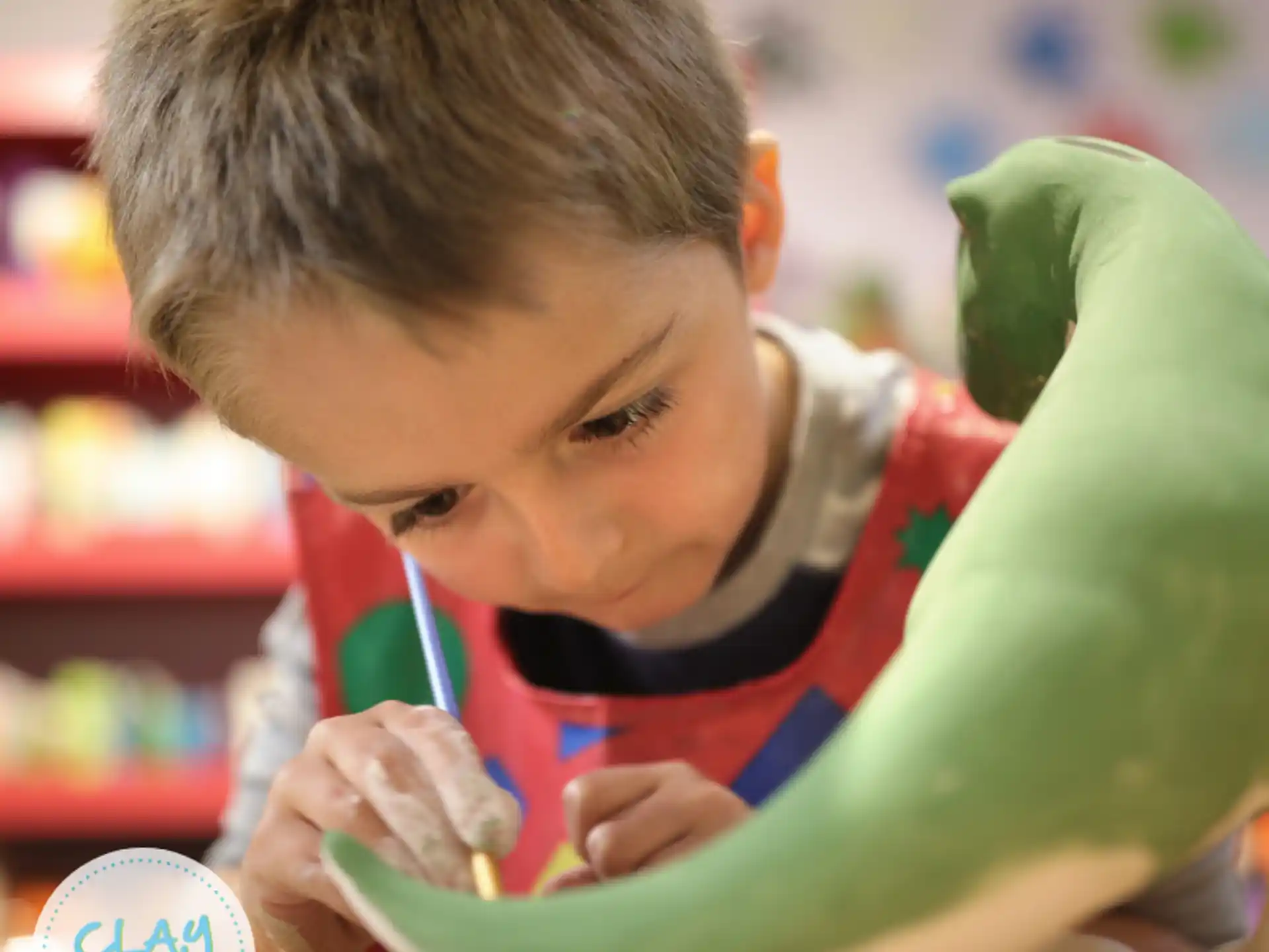 a young boy painting