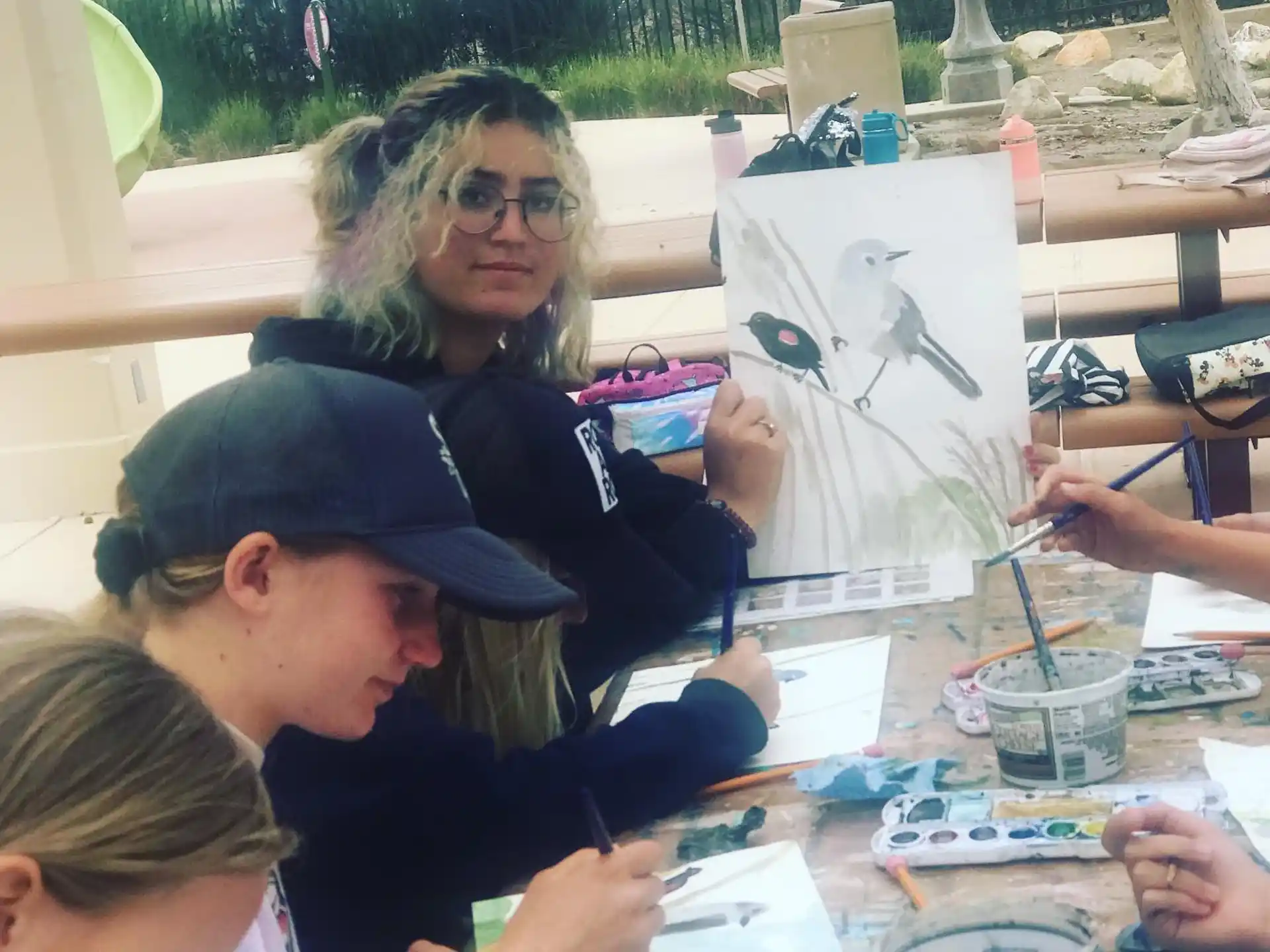 a person drawing on paper