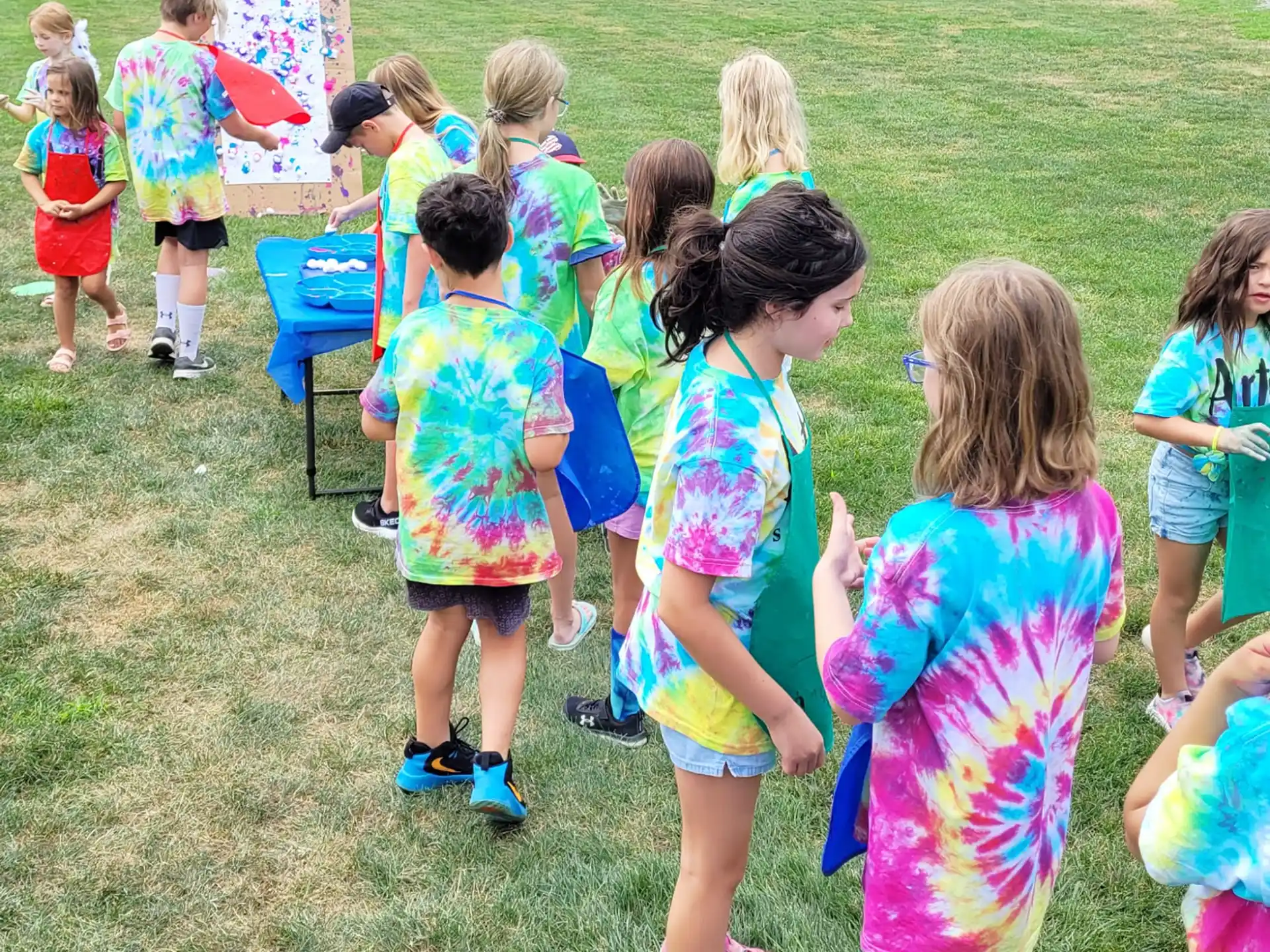 a group of children in a field