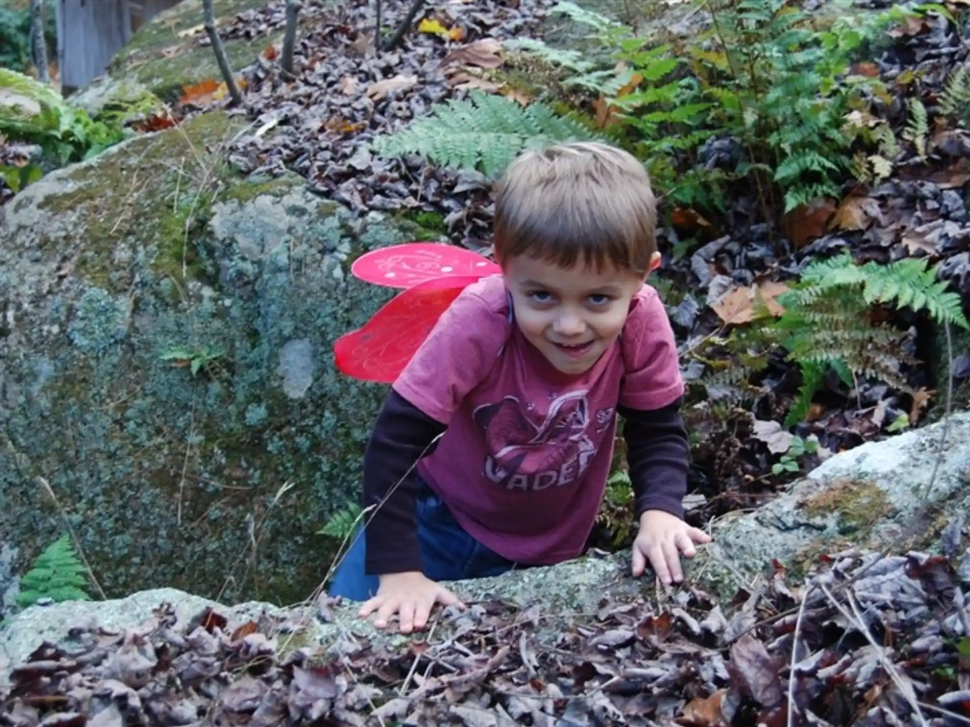 a child playing in the mud