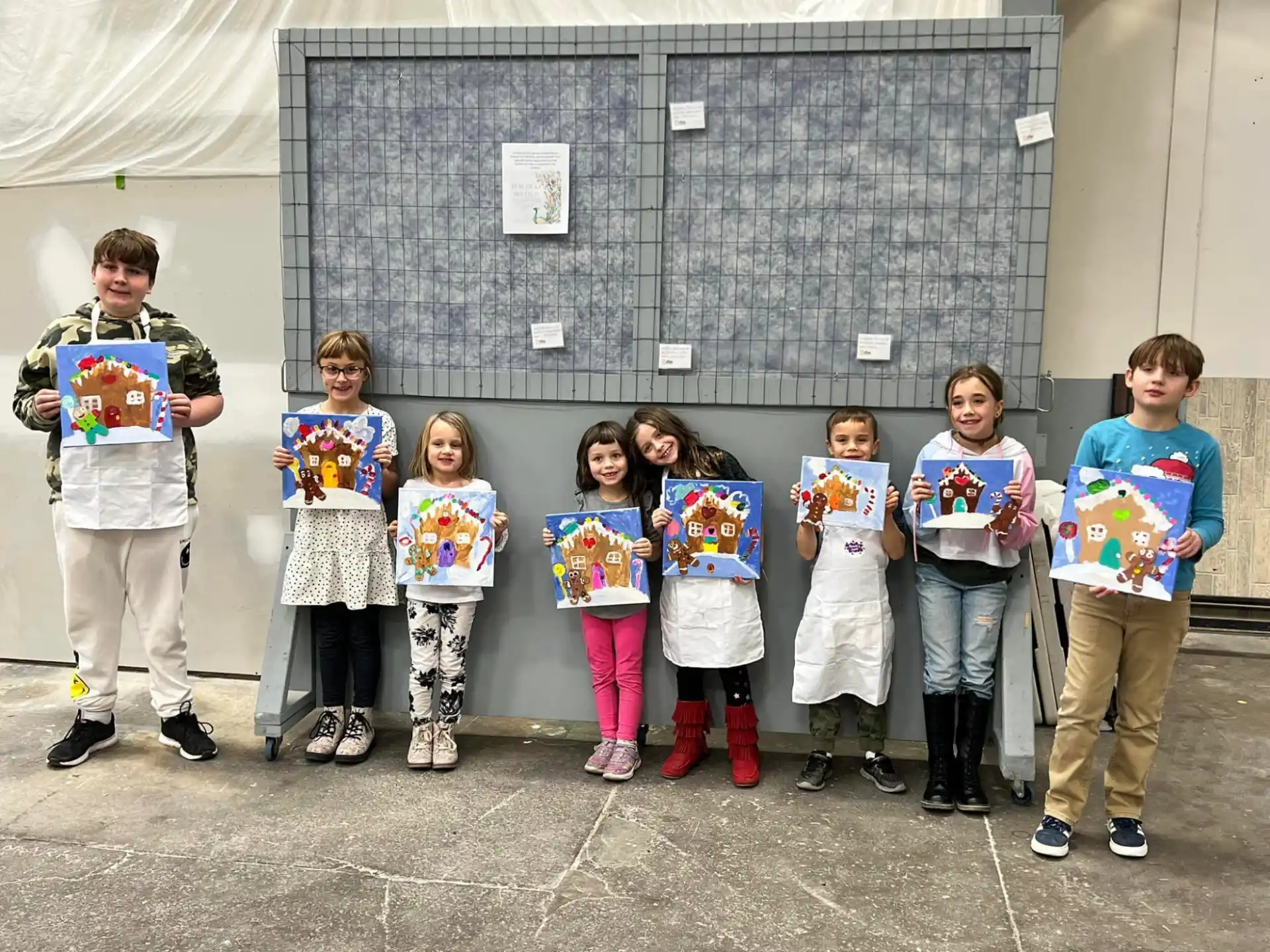 a group of children holding signs