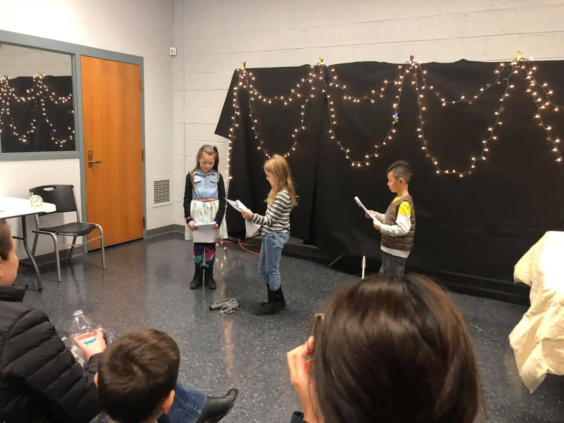 a group of children in a classroom