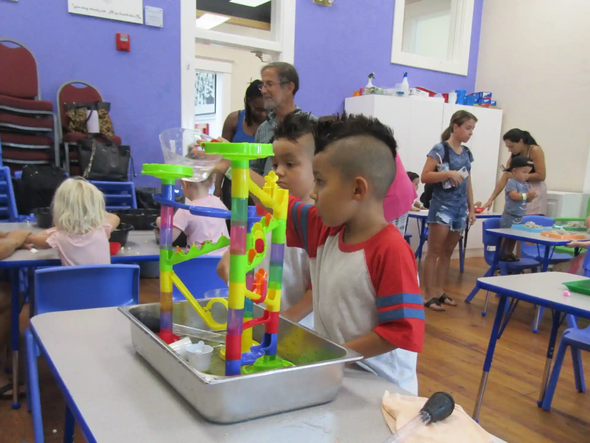 a group of children in a classroom