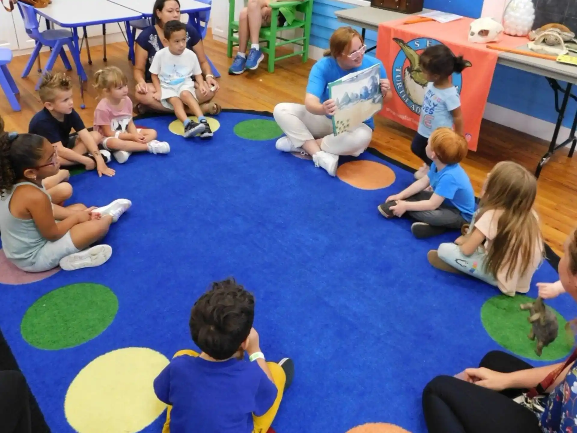 a group of children sitting on the floor