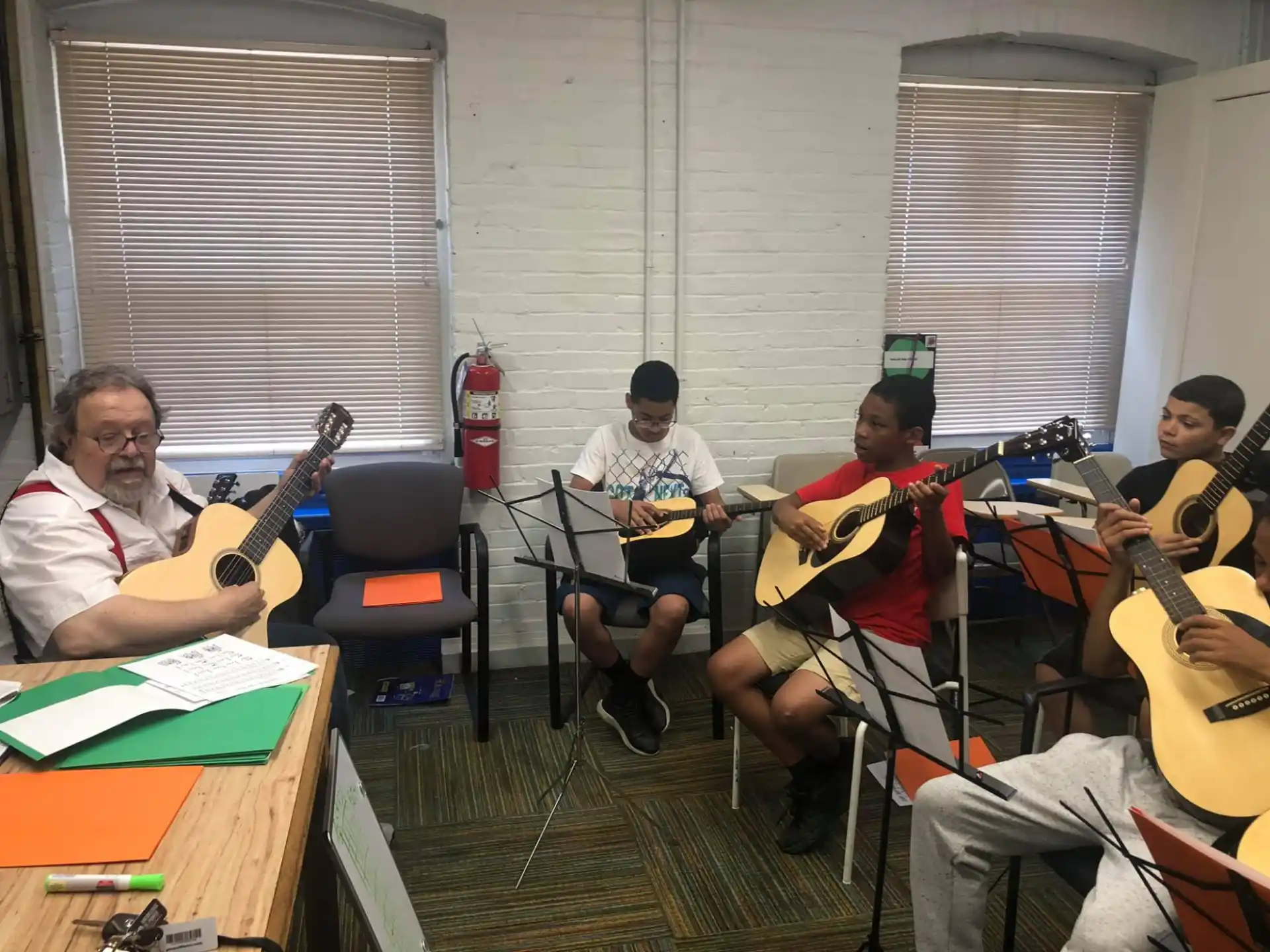 a group of people playing instruments
