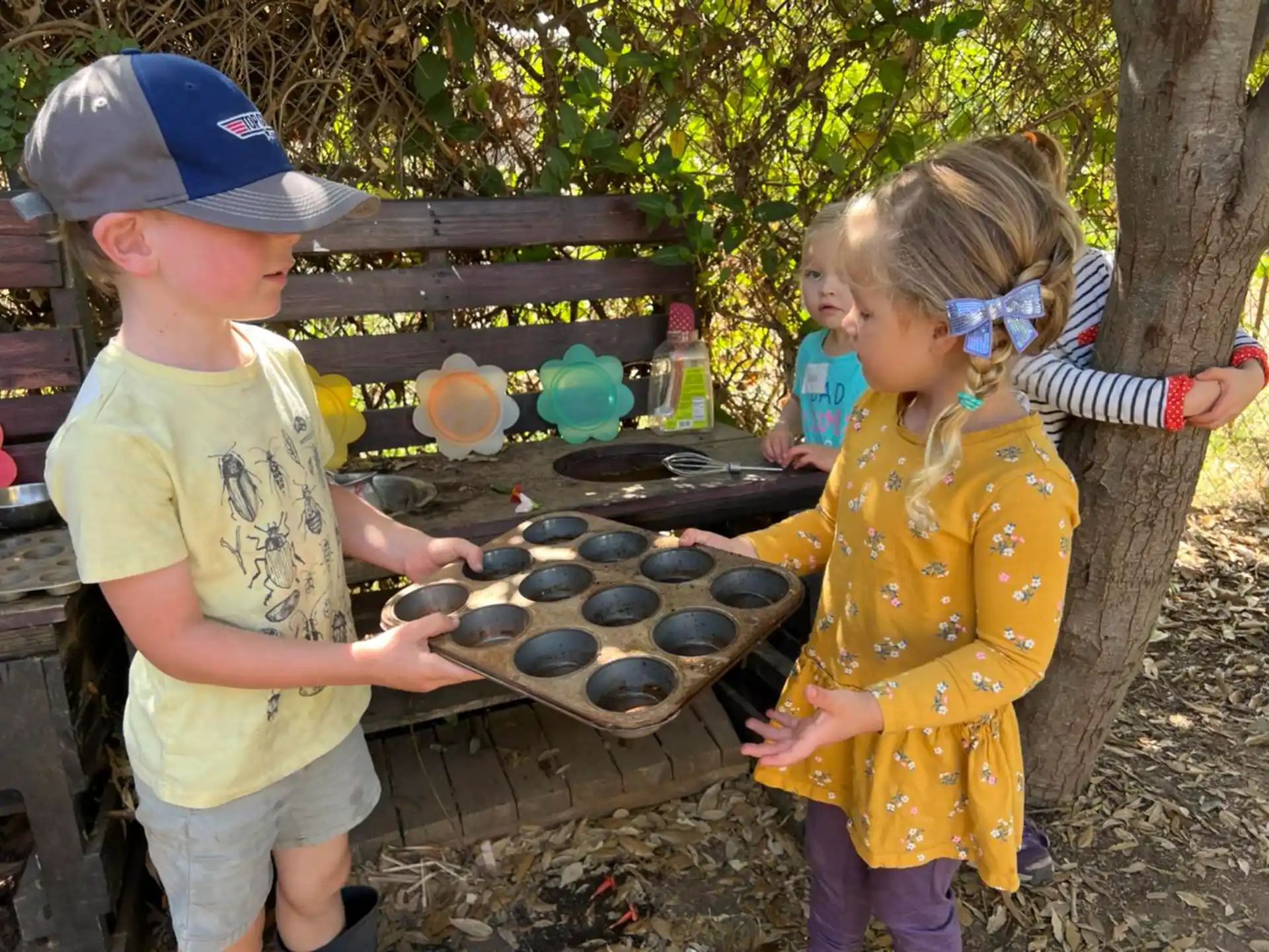a couple of children playing outside