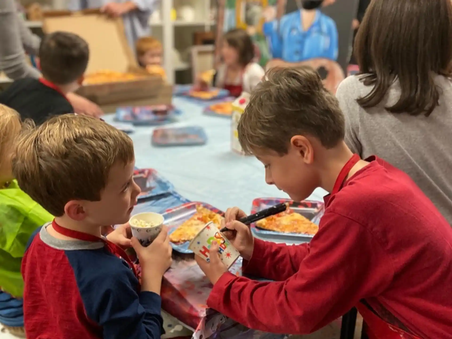 a group of people eating at a table