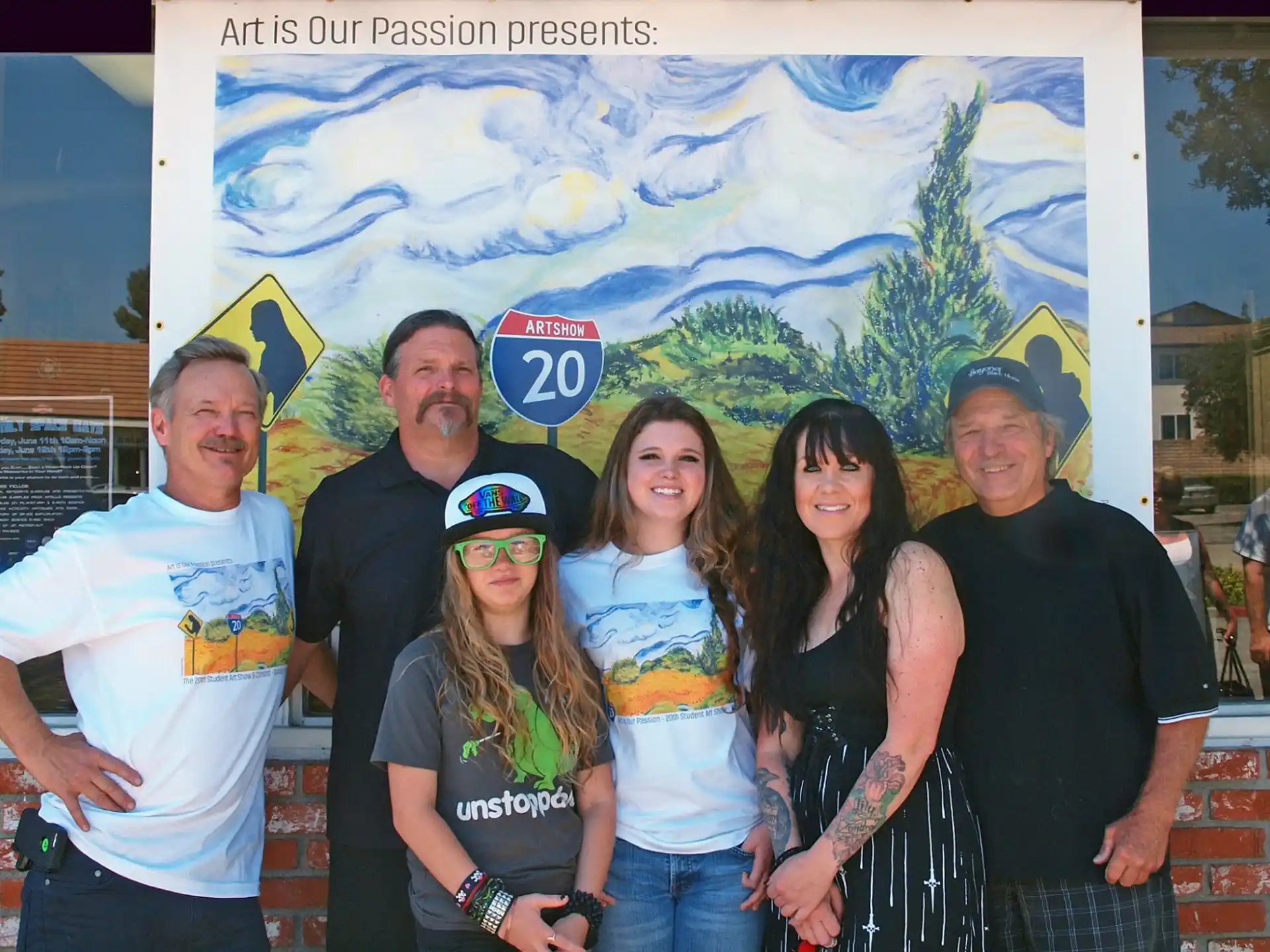 a group of people posing for a photo