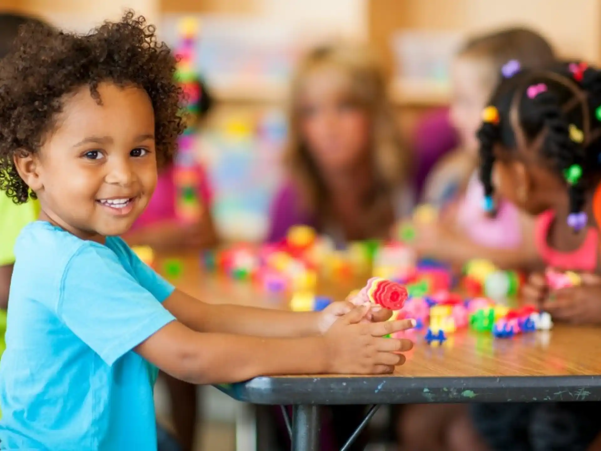 a young girl playing with toys