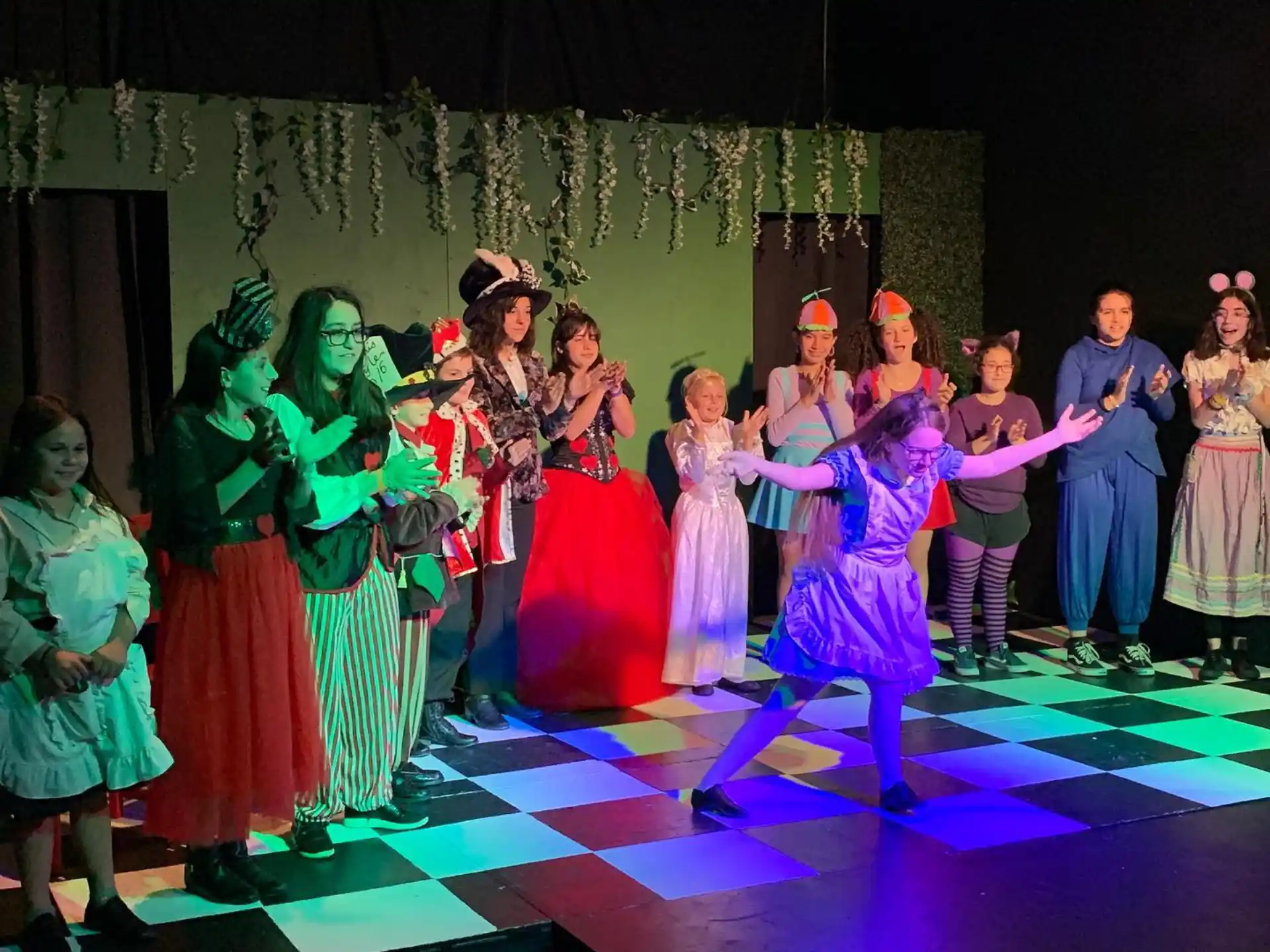 a group of people performing on a stage